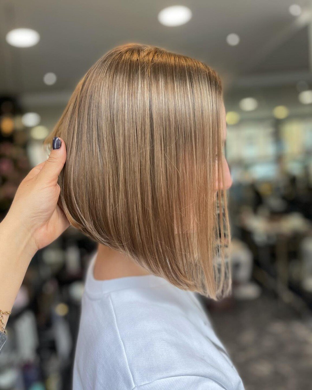 Thinking about making a hair color change for the warmer months ahead? The summer season is an excellent time to try a new hairstyle! 

If you&rsquo;re looking for a more subtle change, this color might be something for you.
Our client asked for a na