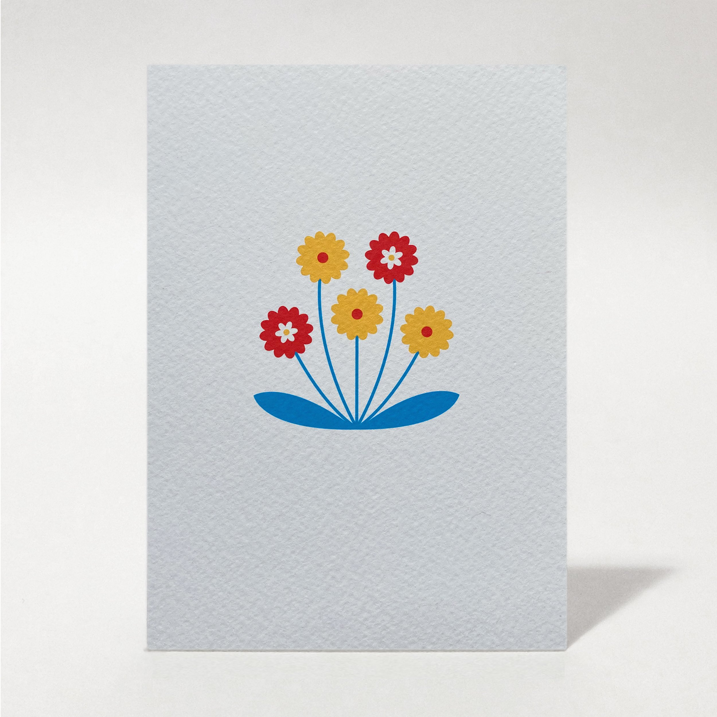 Auri card. A colourful floral greetings card with simple, stylised yellow and red flowers with blue leaves, on white textured cardstock. Designed in Edinburgh by Fiona Moon. Fiuts Printed Goods