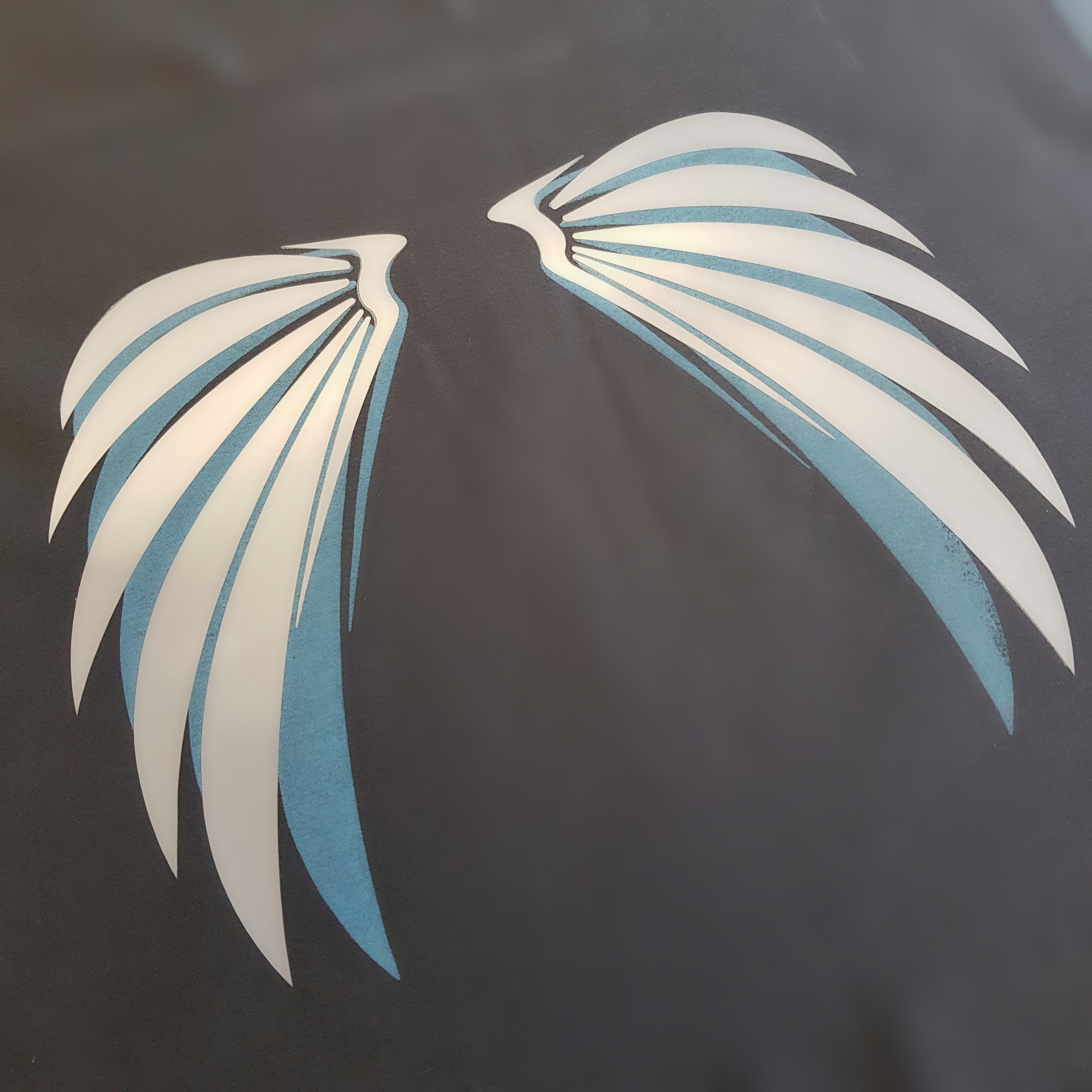 Sparklewear screen printed and vinyl wings pattern