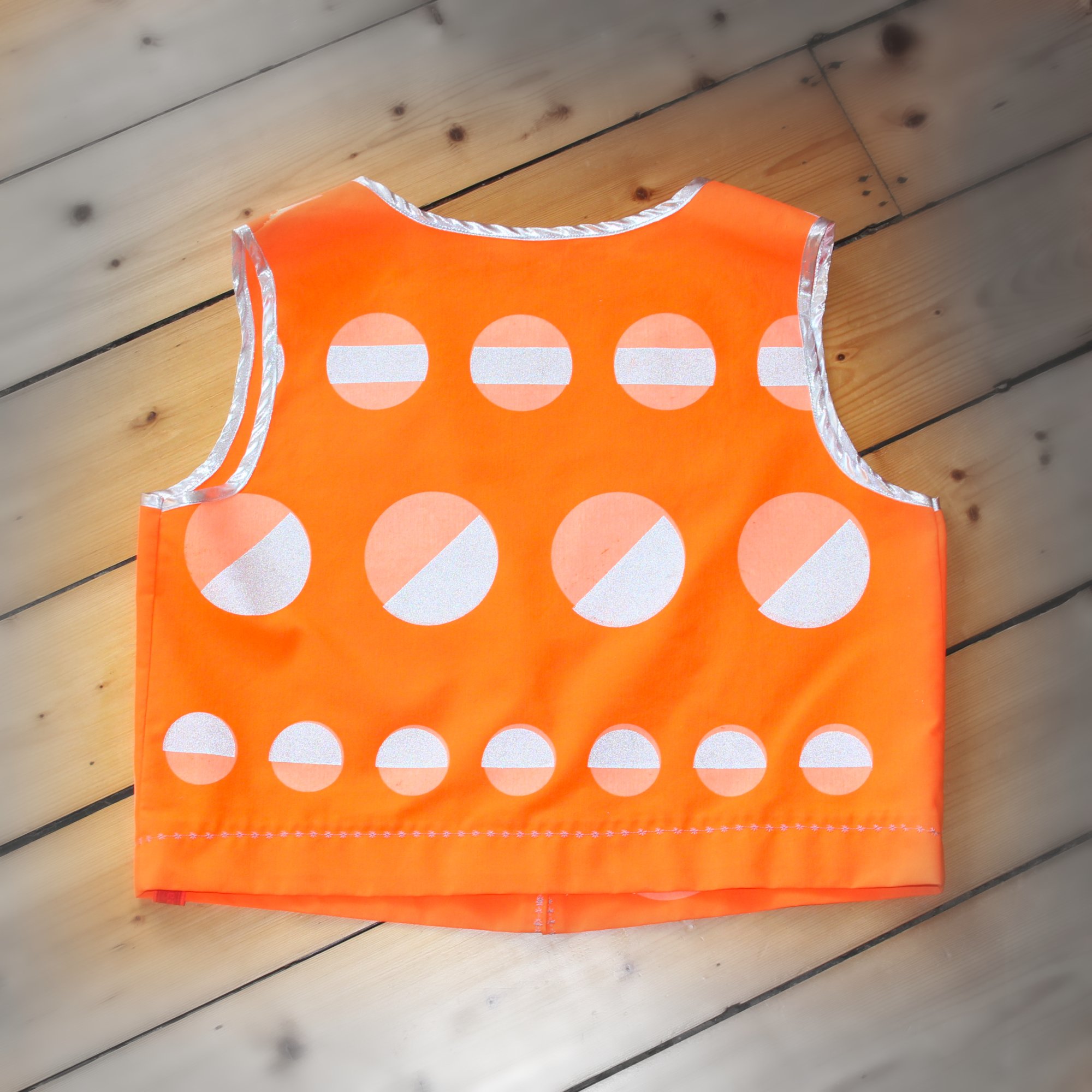 SparklewearOrangeGeometricVestBack.jpeg
