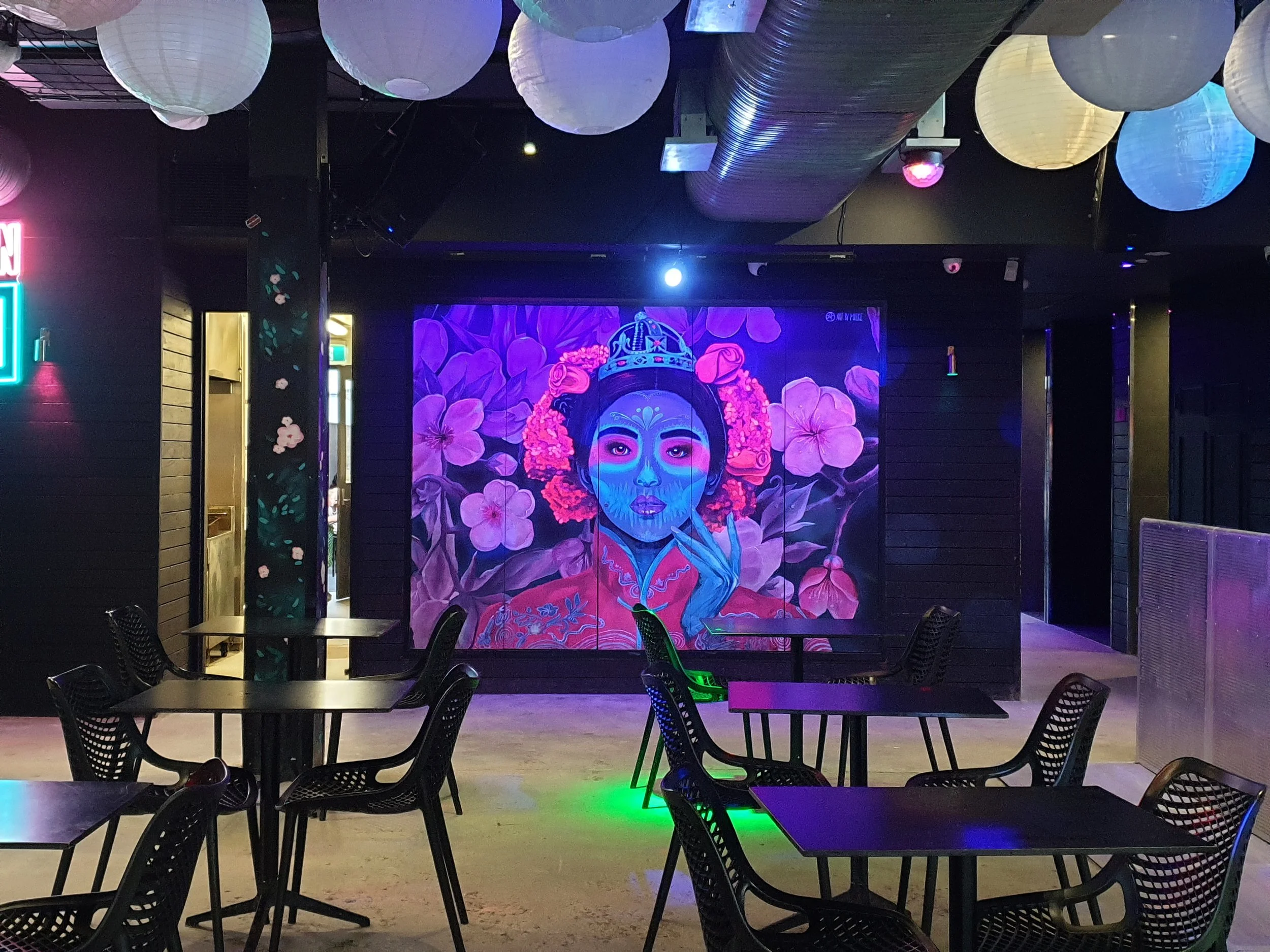 UV reflective mural installation view in restaurant of the Post Office Bar