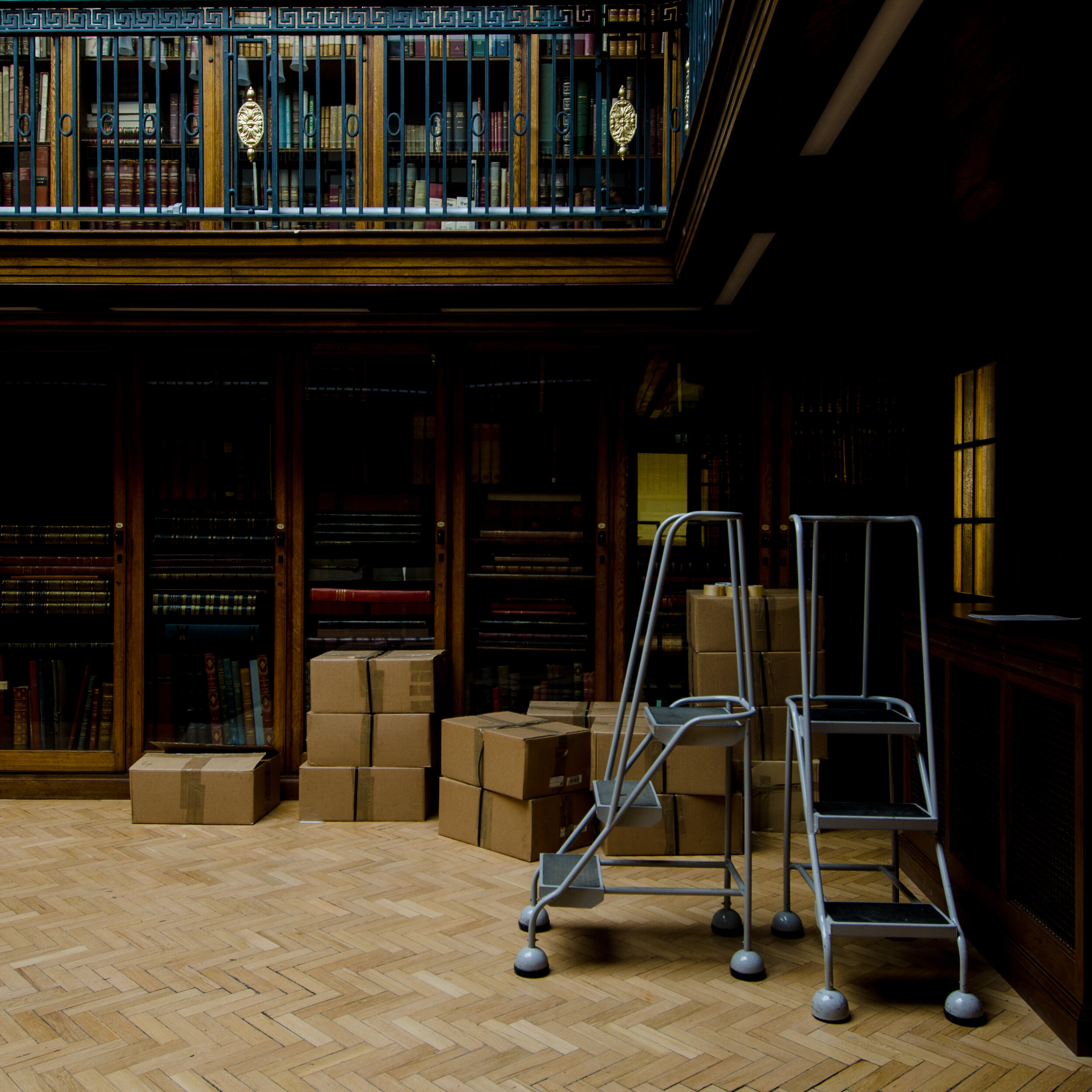 A series of photographs taken during the restocking of Liverpool Central Library after renovation mixed with portraits of people with some of their favourite books. This work was originally shown at Look Photo Festival in 2013.