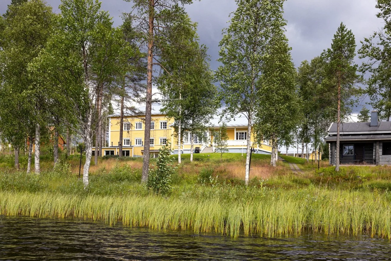 House of Northern Senses viewed from the lake in summer