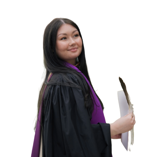 A young woman in a graduation gown holding a diploma, smiling with a white background.