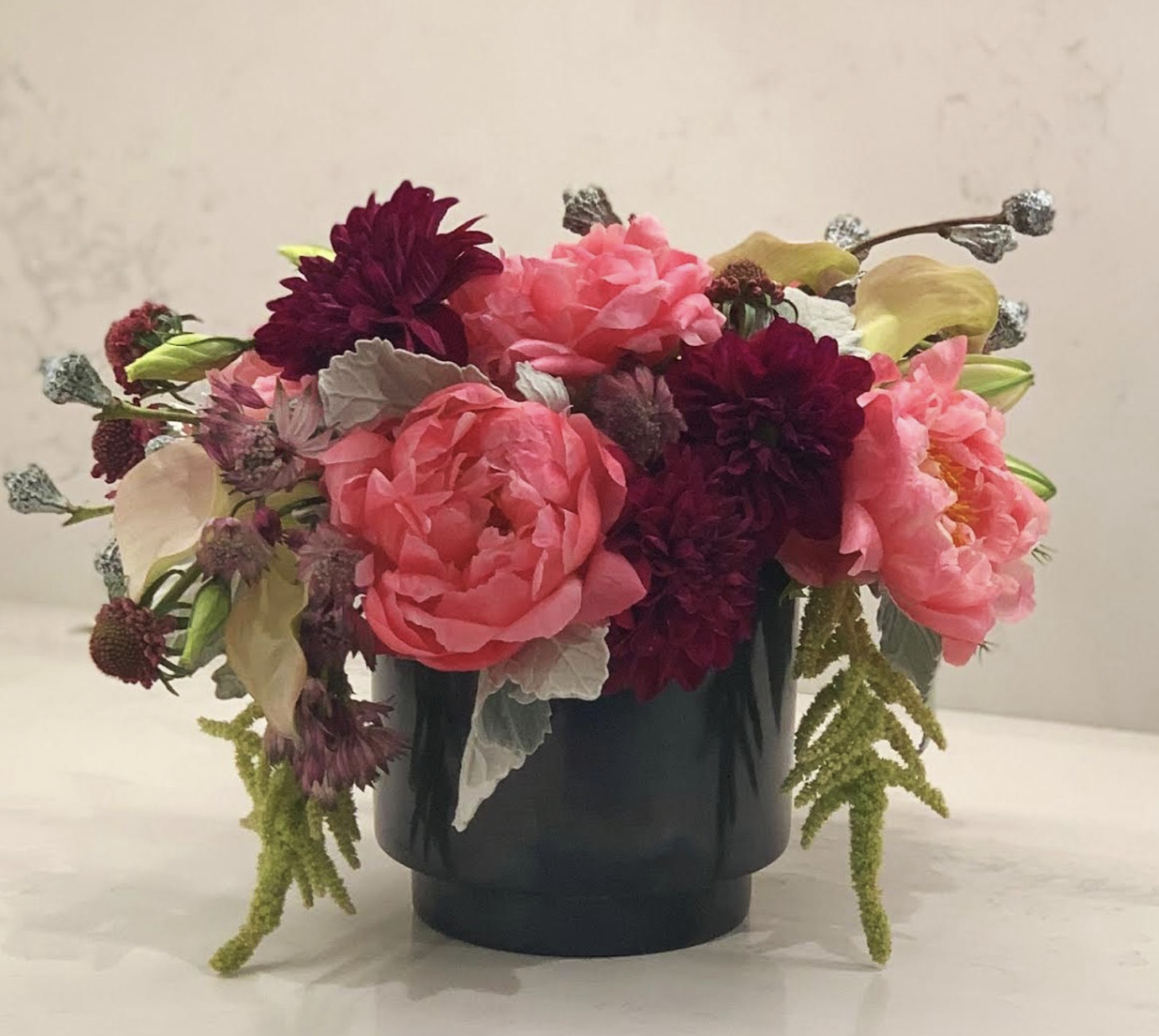 Eucalyptus Pods, Peony, Scabiosa, Dusty Miller, Calla Lily, Astrantia, Dahlia, Lily, and Amaranthus