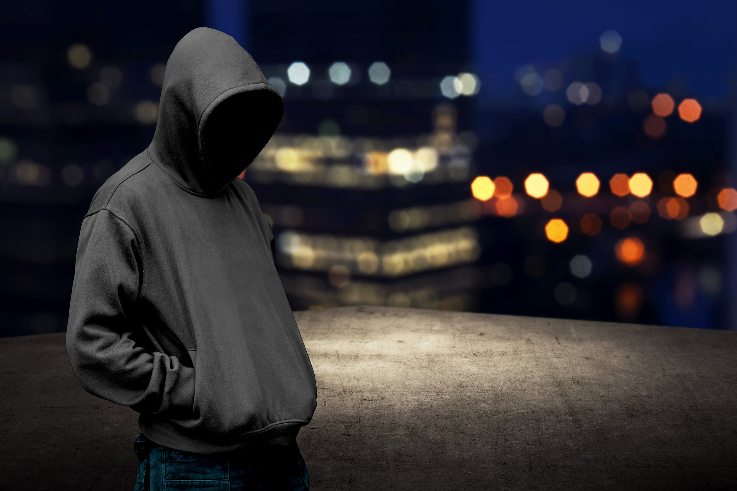 Faceless-man-in-hood-on-the-rooftop-486864098_6000x4000.jpeg