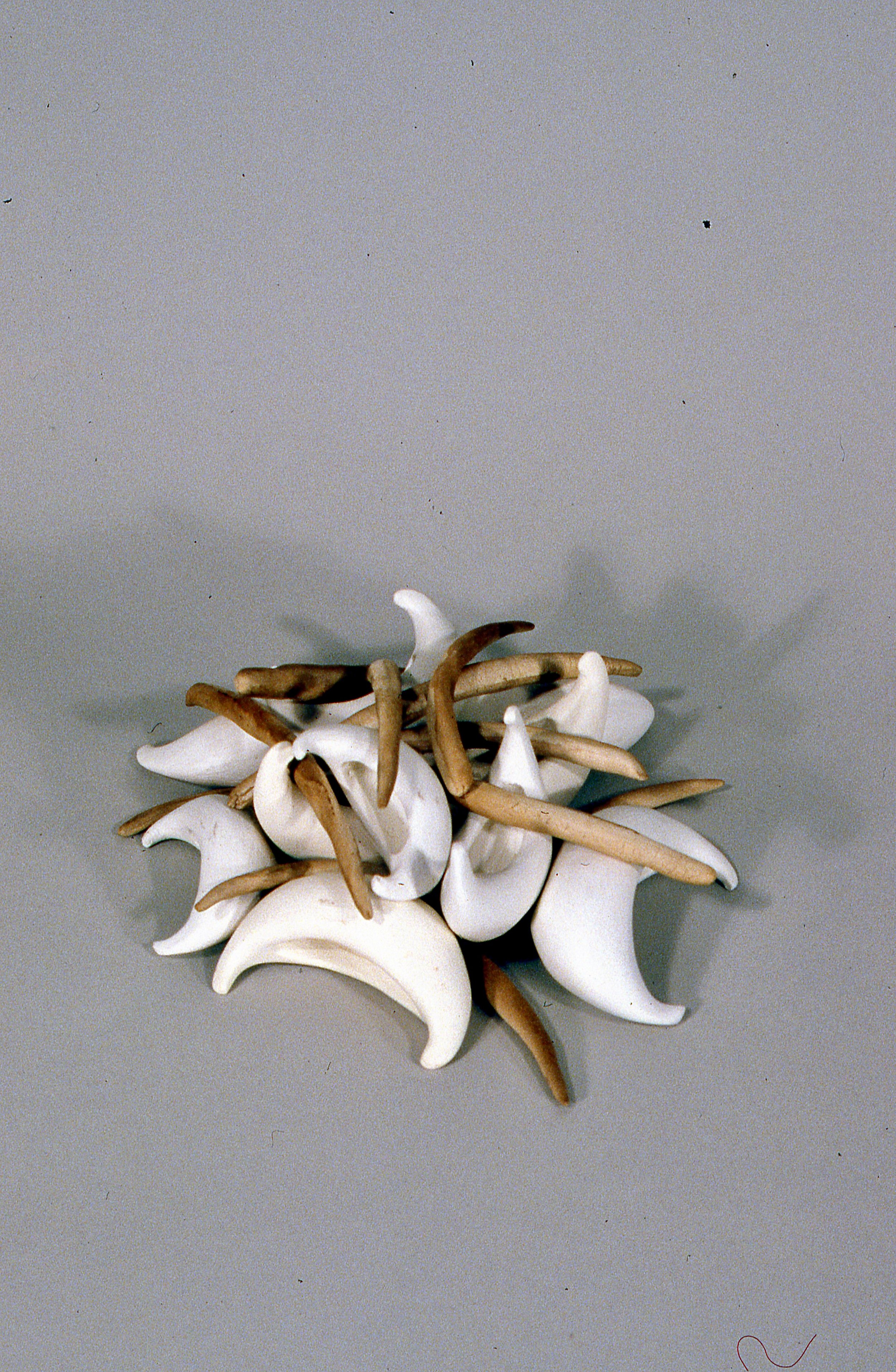 Pile of Boats and Bones, KBDesrosiers, 9%22x9%22x4%22, fired and stained clay.jpeg