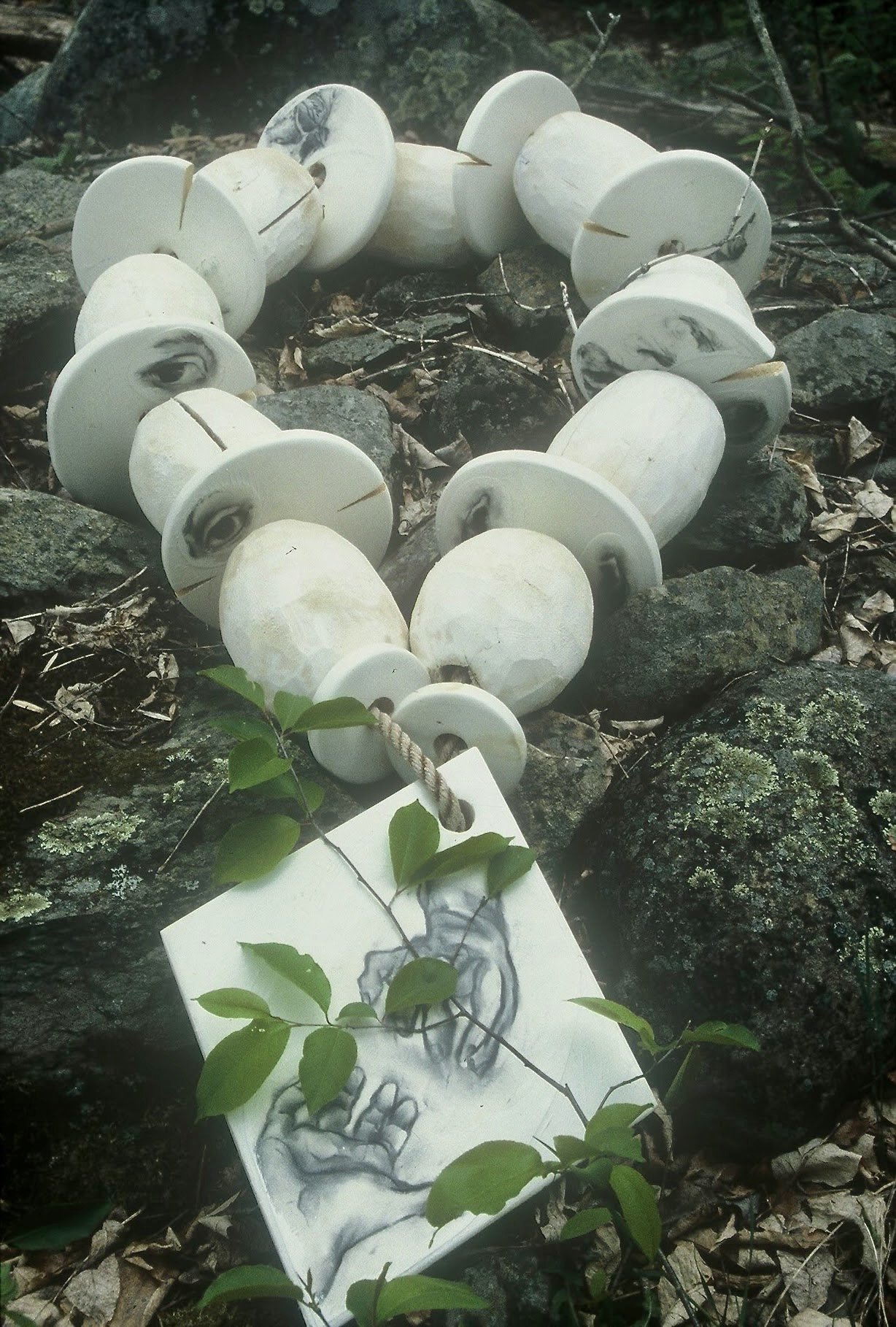 Giant's Rosary, KBDesrosiers, 6%22x2'x5', painted wood, rope,collage.jpeg