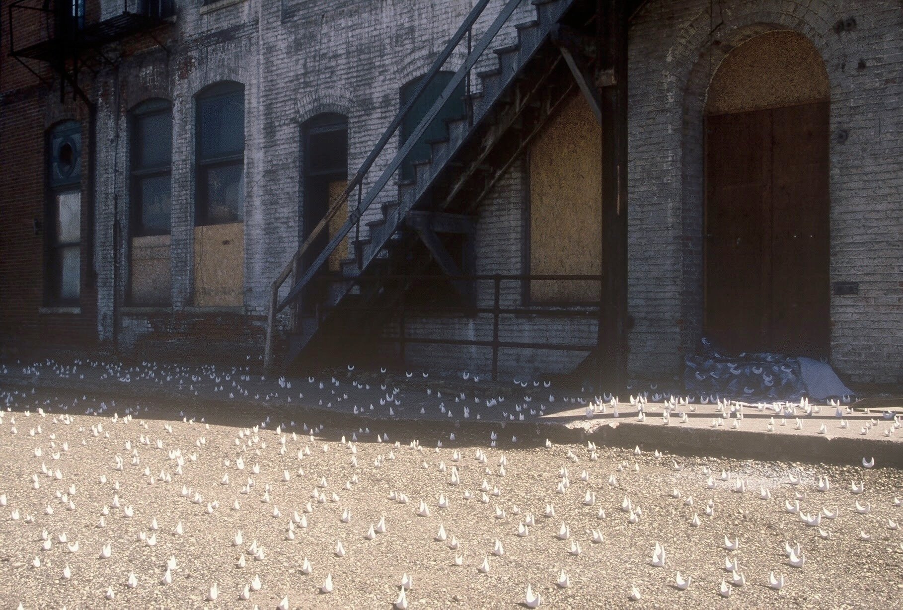 Fleet at an Abandoned Factory, WI, detail of Fleet quilt and fleet, KBDesrosiers, installation of clay forms.jpeg