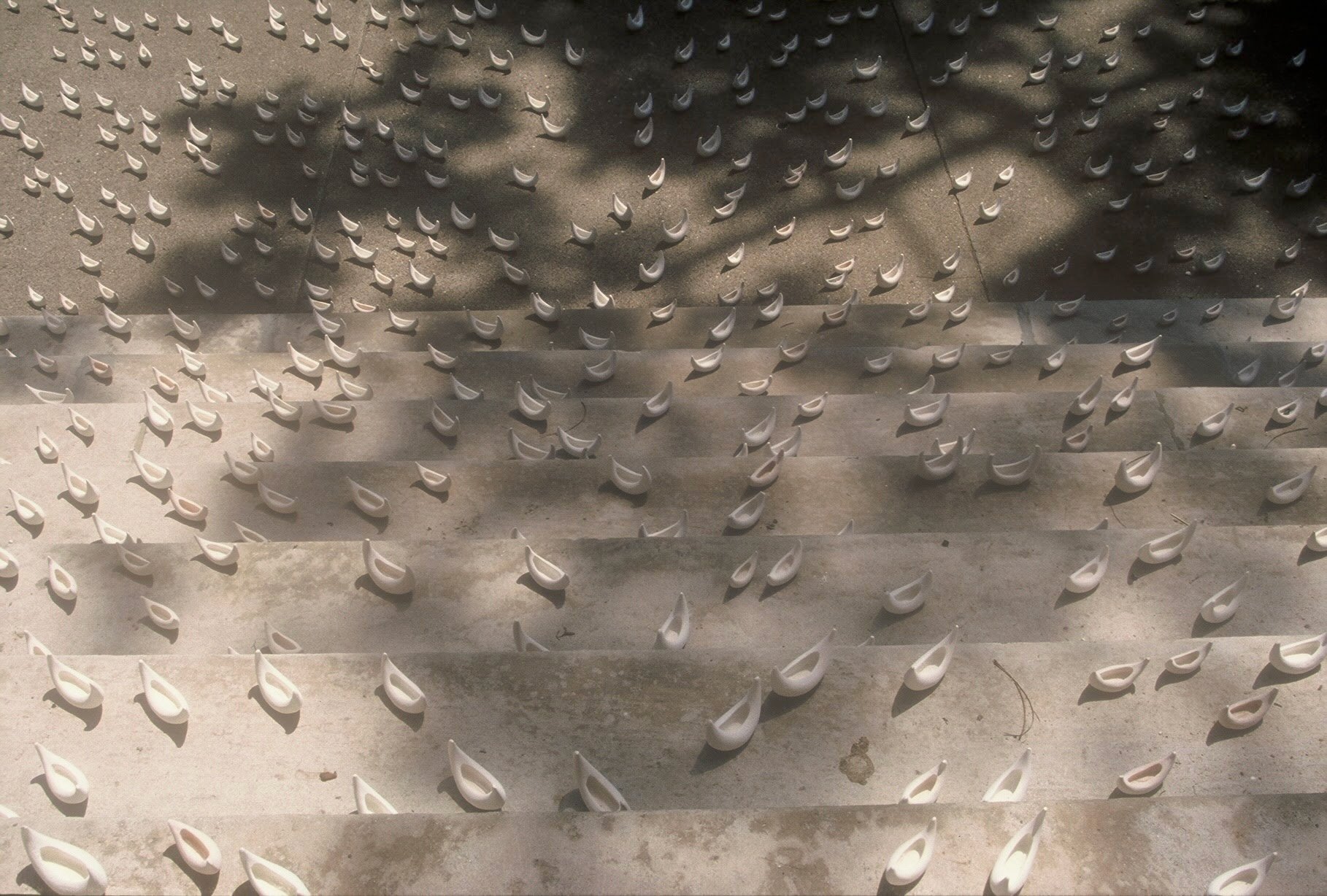 Fleet on Sun-Dappled Steps,, LaCrosse, WI,KBDesrosiers, installation of clay forms .jpeg
