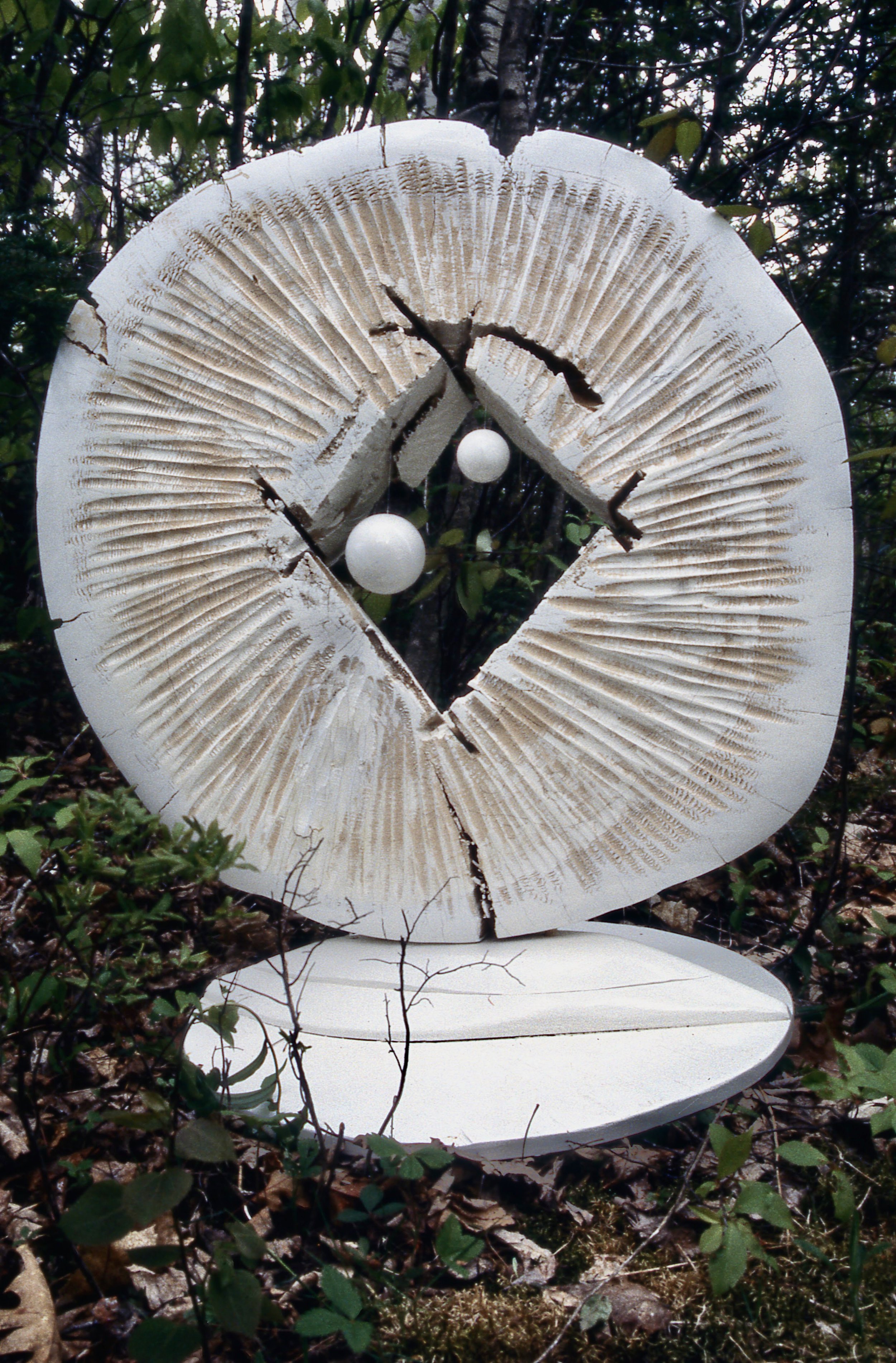 Universe Disc With Two Planets, KBDesrosiers, 24%22x24%22x4', carved and painted firewood and monofilament.jpeg