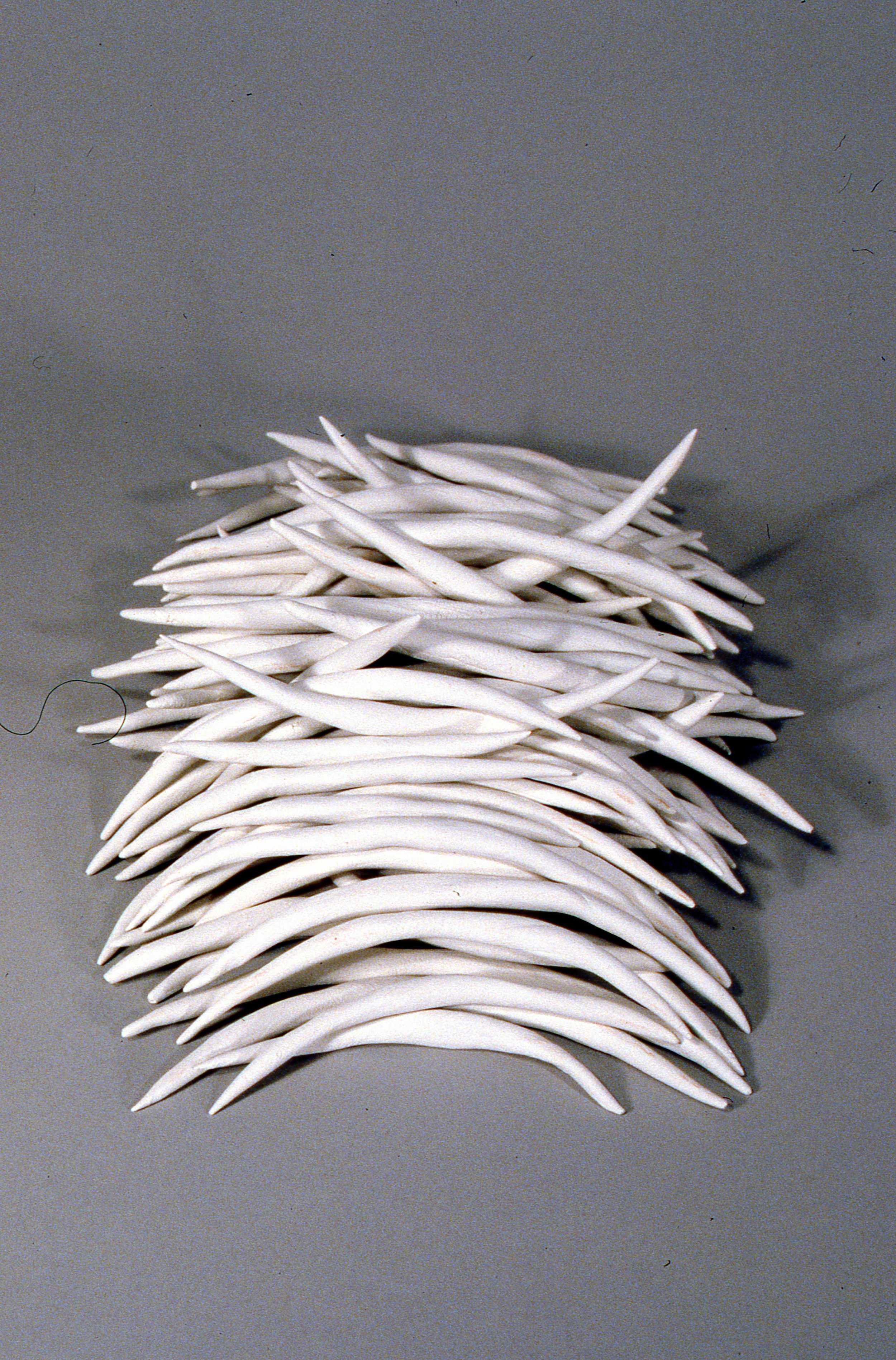 Stacked Bones, KBDesrosiers, 3%22x5%22x8%22, fired clay.jpeg