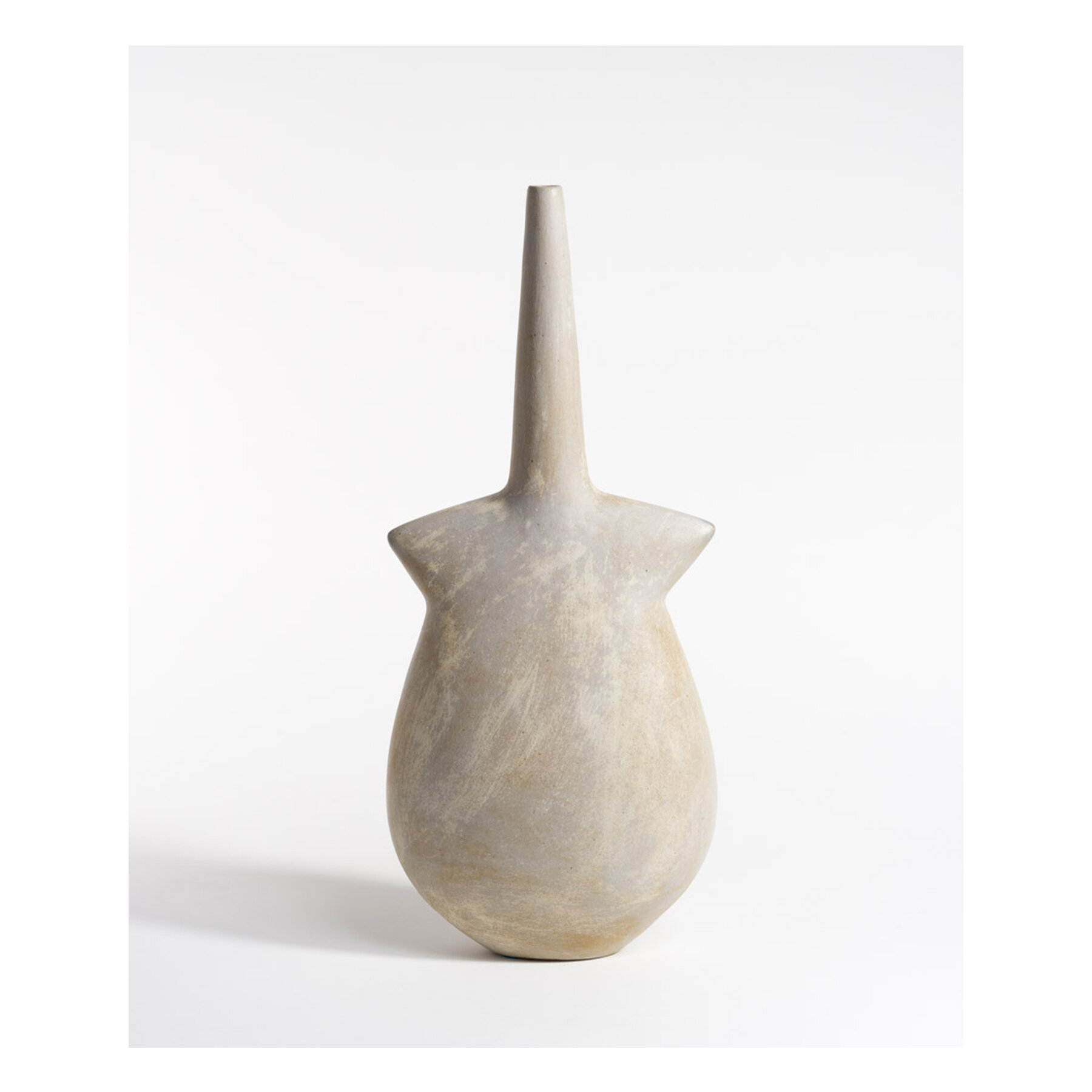 Wayne was influenced by a vast array of historical and contemporary art. Many forms he created echo those found in ancient Cycladic traditions. In this sculptural bottle made in 2015, he references a Beycesultan type idol figure, similar to the work 