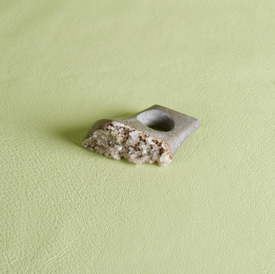 Hill Holding Sculpture, 2022, Greywacke with Quartz, 2”x ⅞”x 15/8”