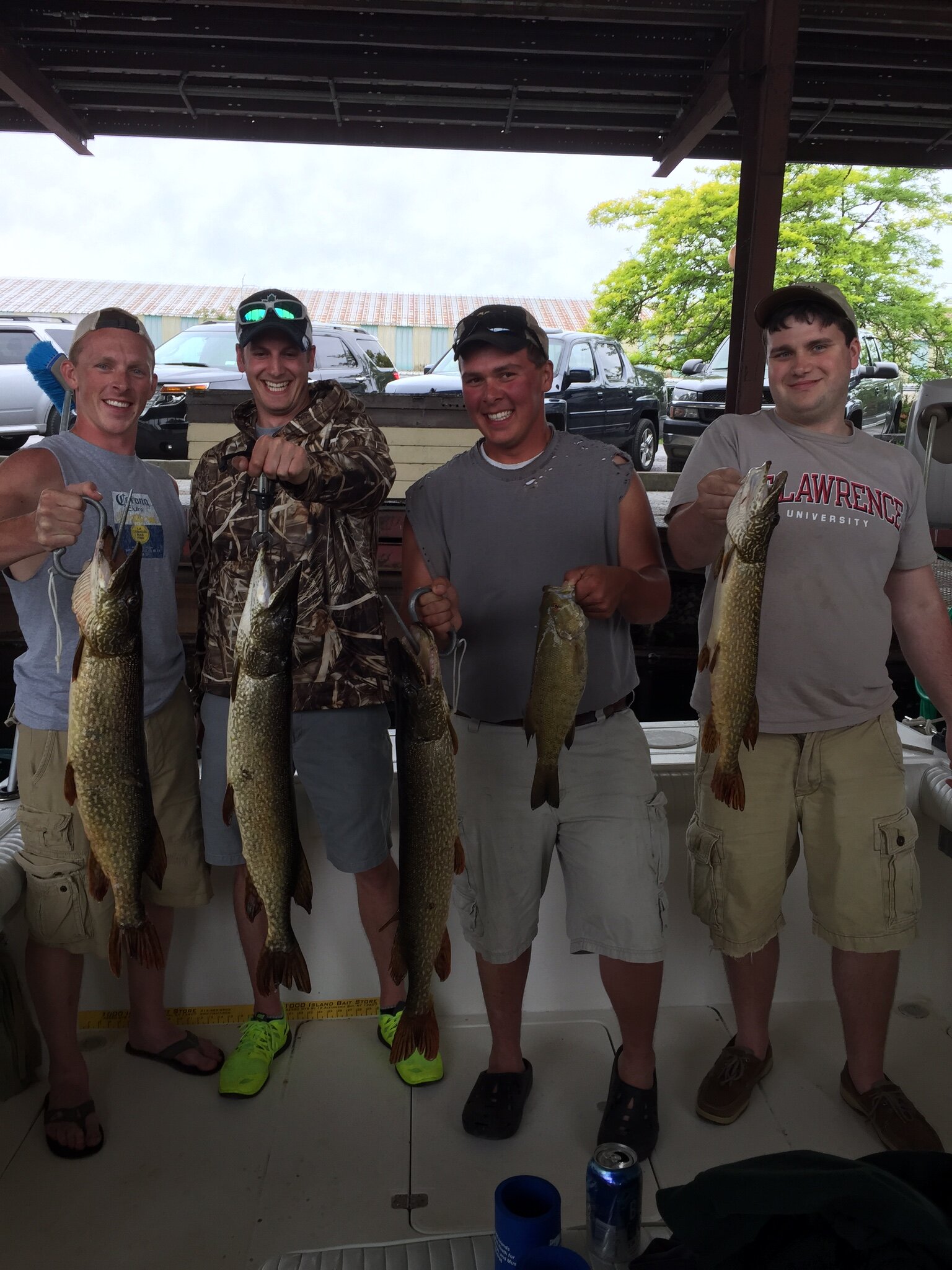 St Lawrence River group of men holding fish