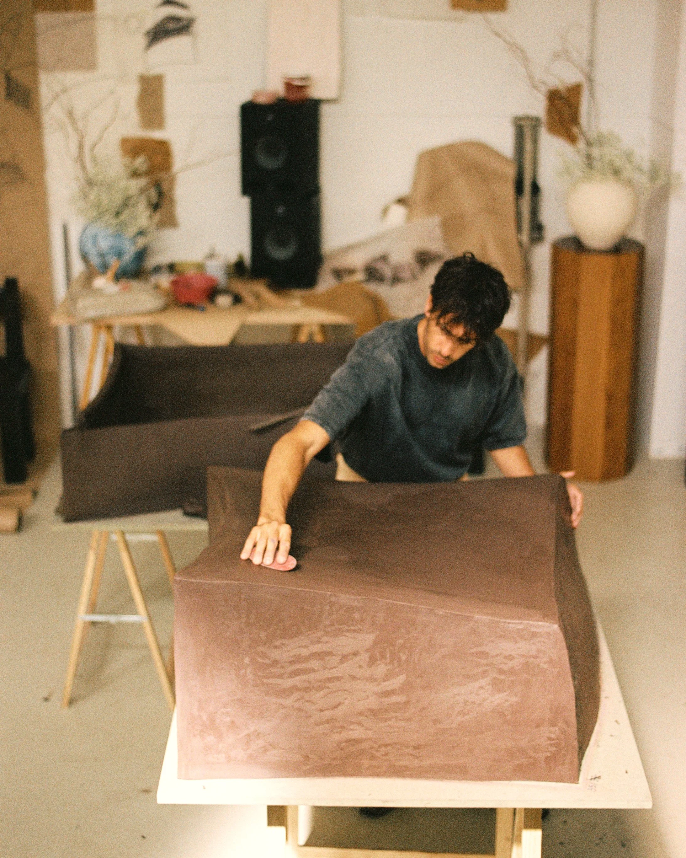 In the atelier, a piece shaped and sanded by hand