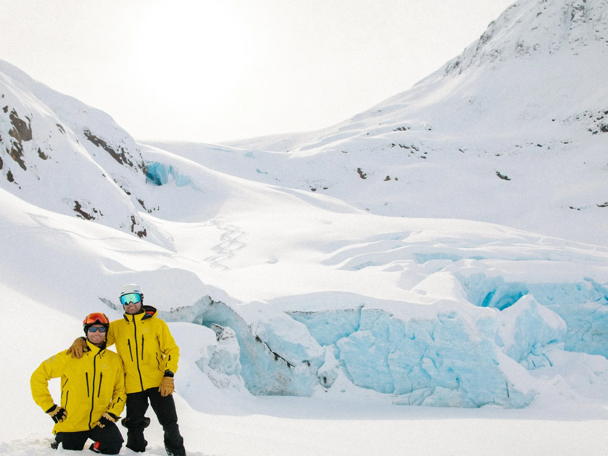 Brenn and Bibby (Guides) stoked after confirming that the glacial cave does in fact "go"... see tracks.