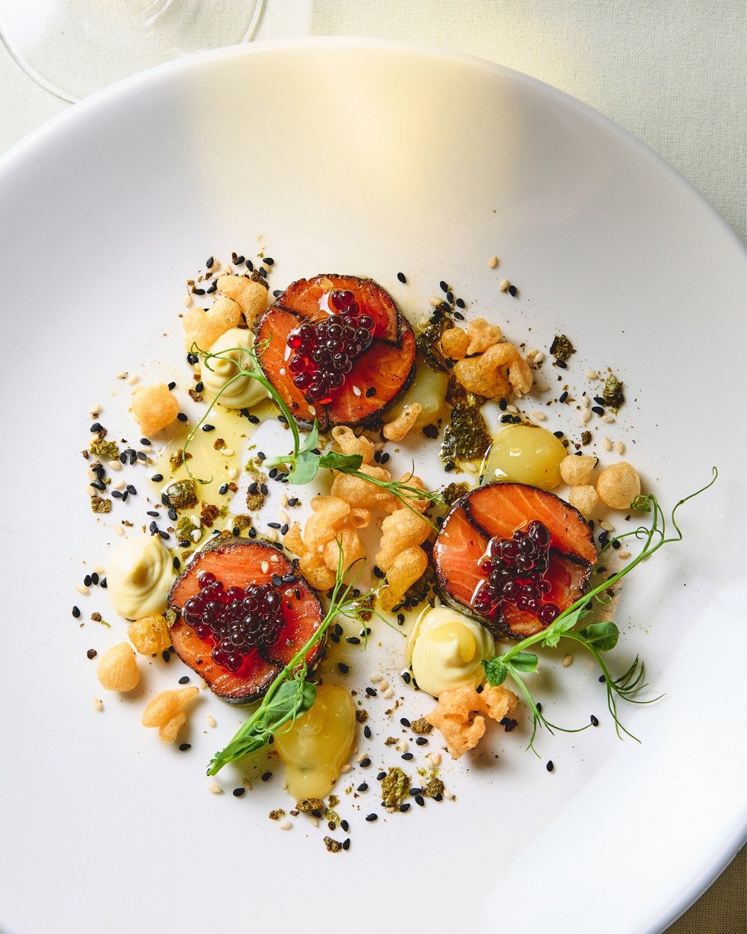 Chilled Salmon Mosaic | allium ash, soy sauce pearls, tempura crumb, lemon gel, wasabi aioli, furikake

📸 @briansamuelsphotography