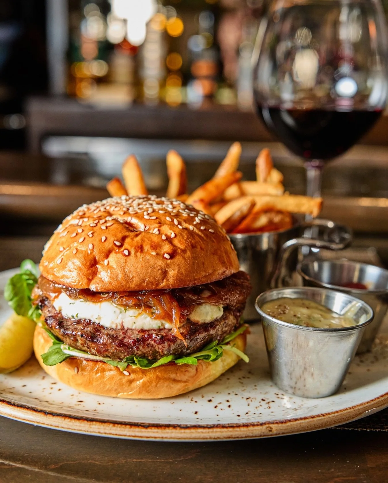 Burger &amp; Bordeaux? We&rsquo;re all in. Join us at the bar.

📸 @briansamuelsphotography