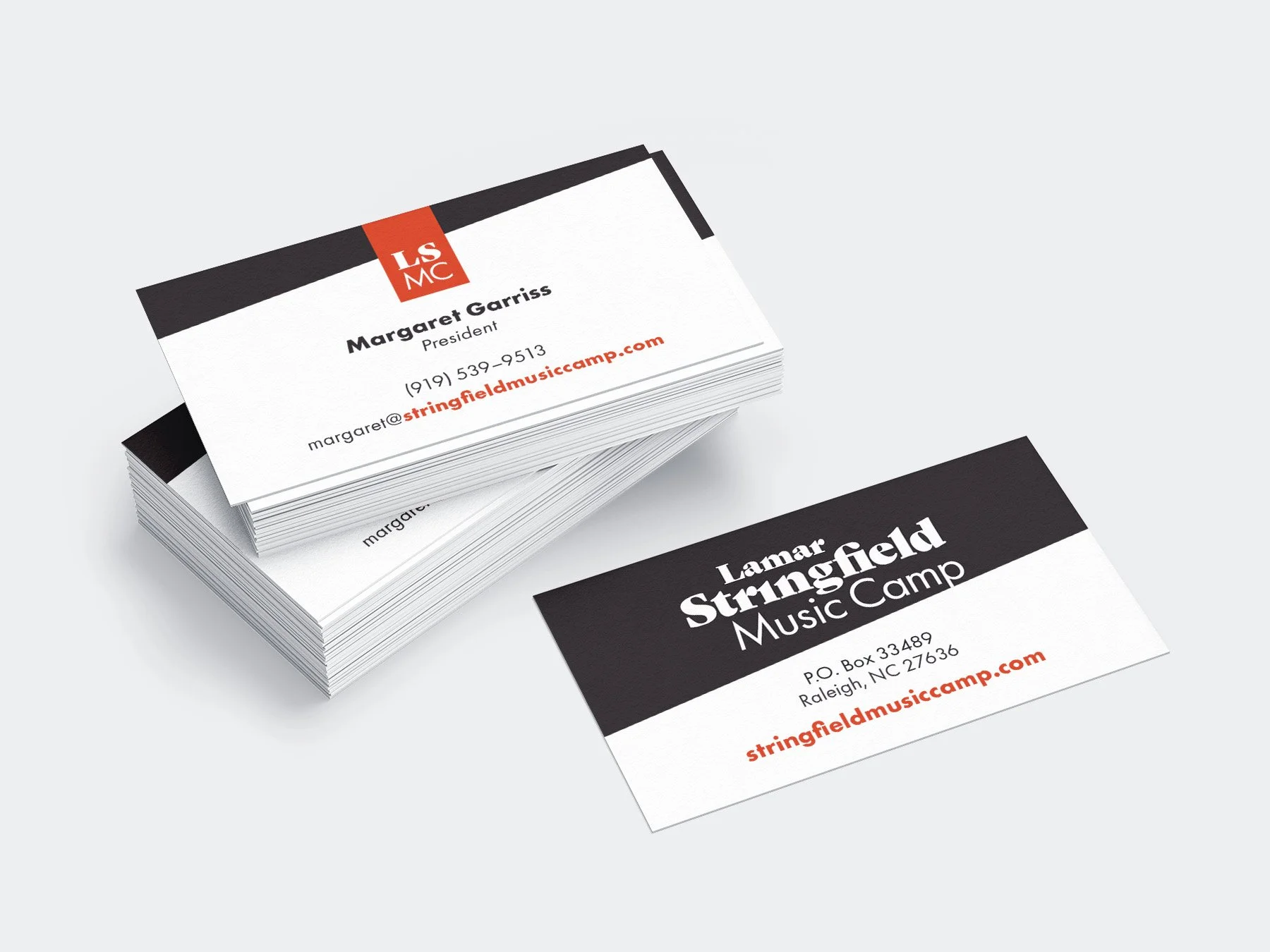 A stack of branded business cards.