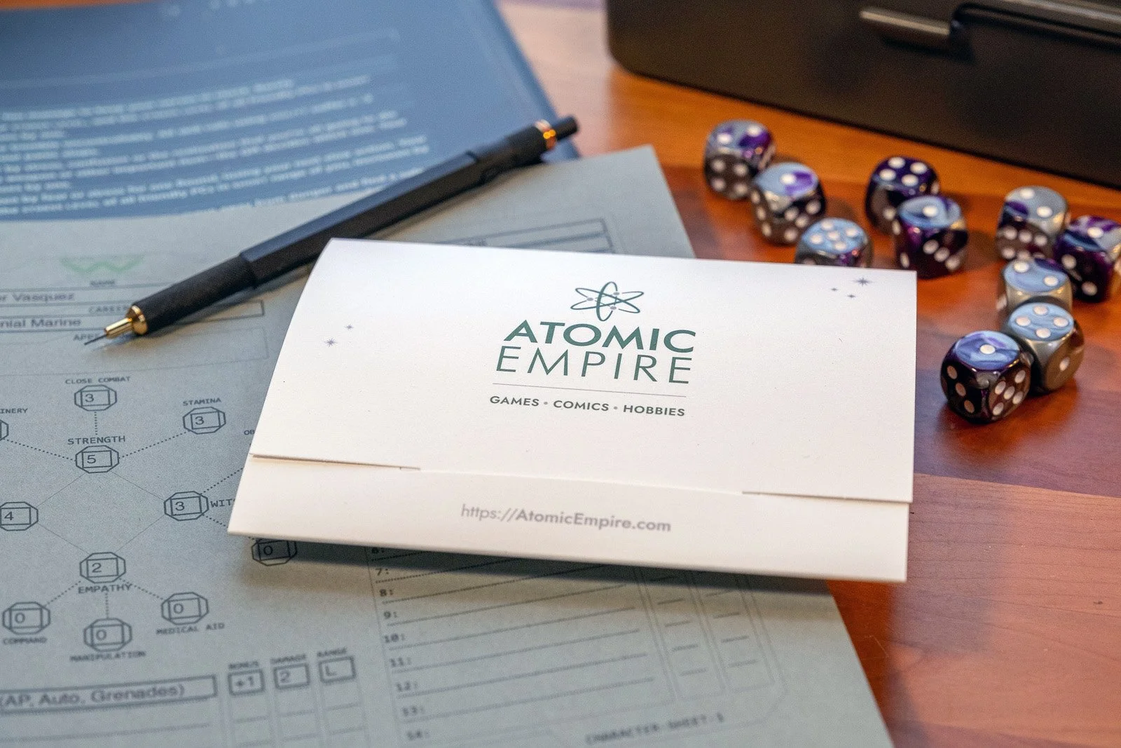 A photo of Atomic Empire's entertainment voucher card holder.