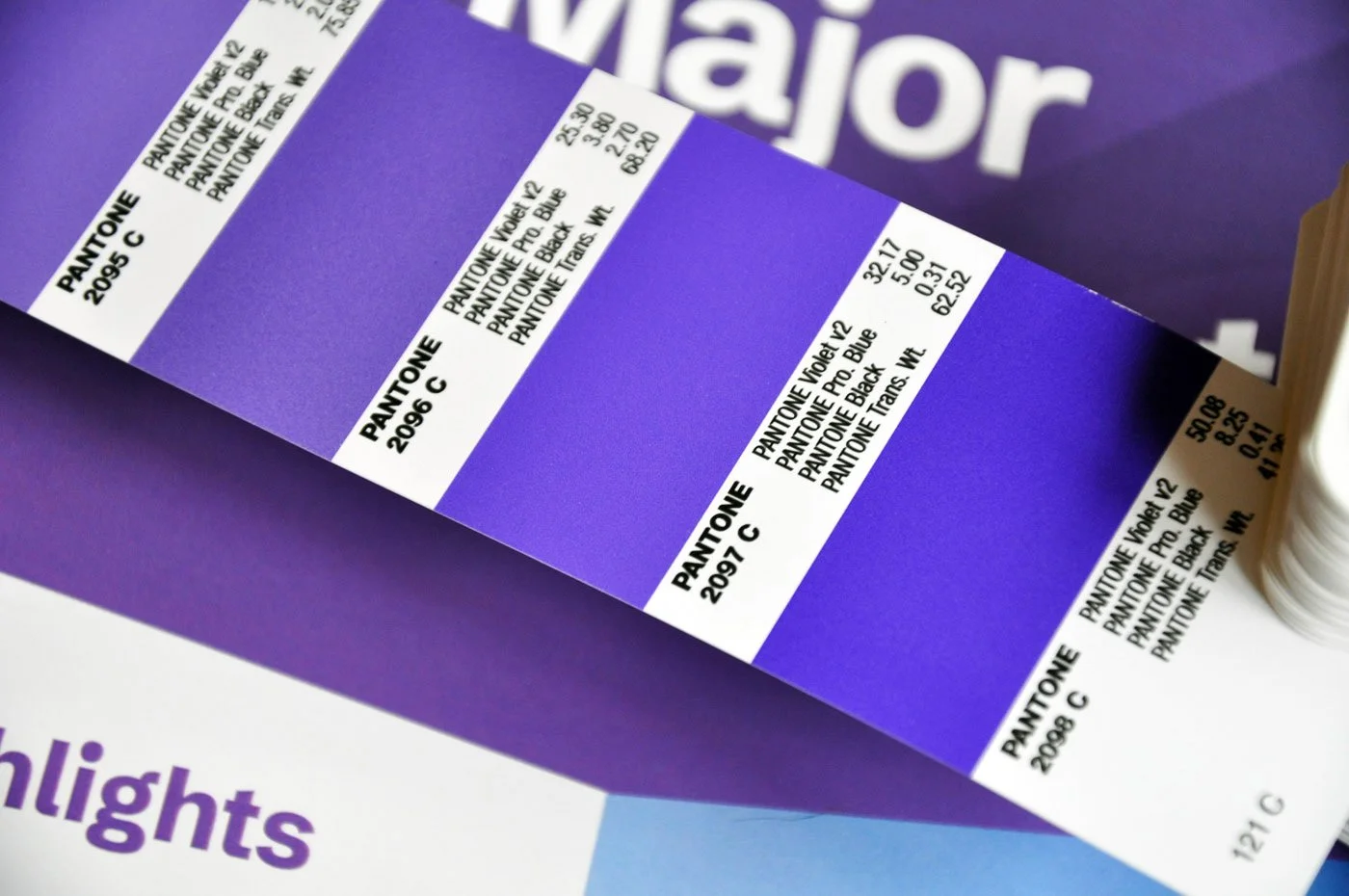 A photo of DDI's Pantone swatch compared to the print.
