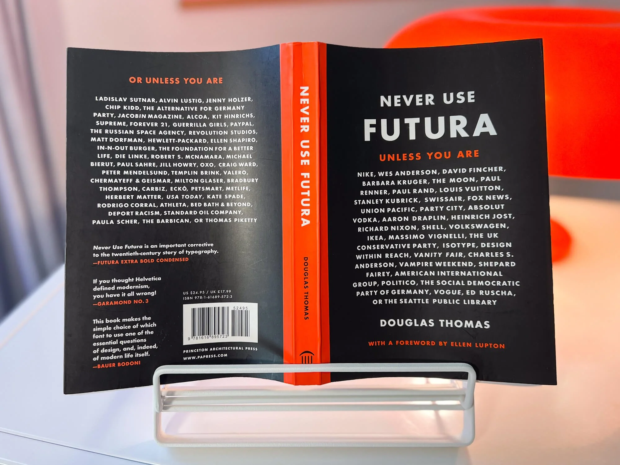 A photo of the book cover showing front, back, and spine.