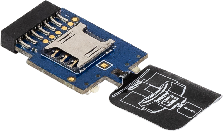 MicroSD card inserted into an adapter or reader with a black and white diagram on a black background.