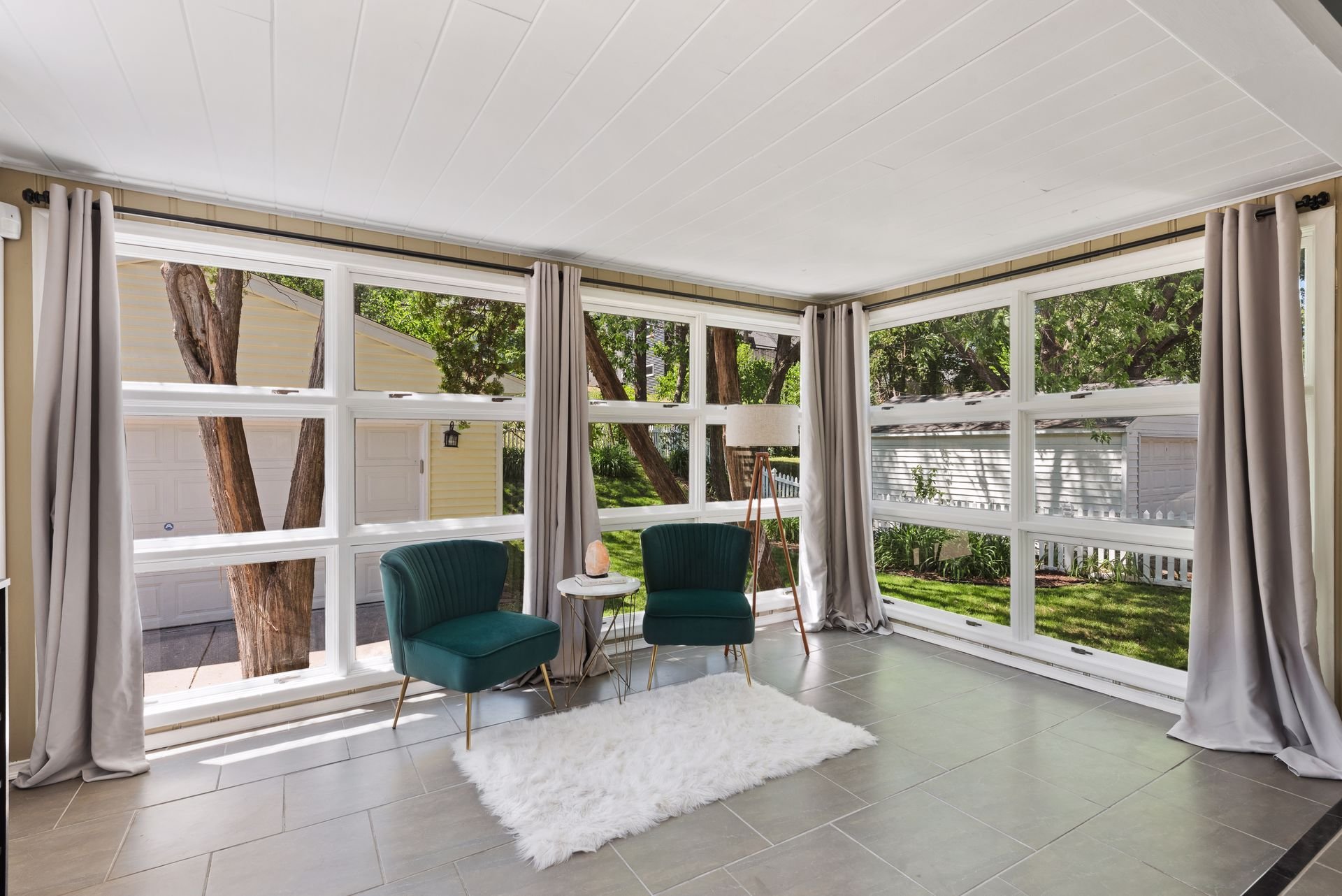 19. Sunroom with windows on 3 sides.jpg