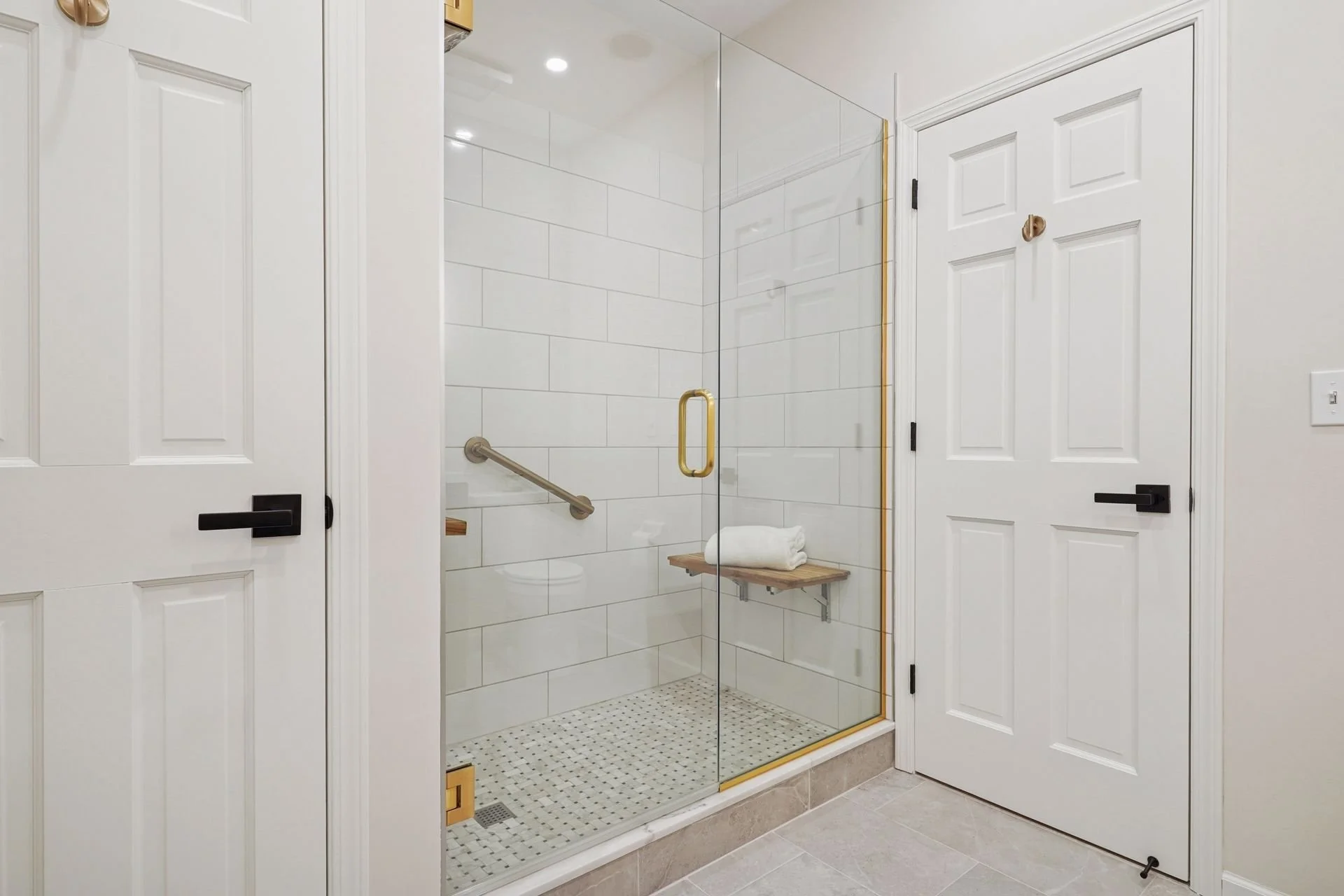 27 Owner's bath is included in the whole-home audio system via ceiling speakers.jpg