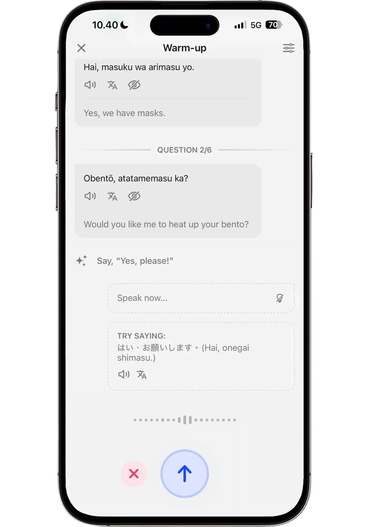 A Speak Japanese AI Q&A warm-up where the convenience store clerk asks "Obentō, atatamemasu ka?" ("Would you like me to heat up your bento?") and the learner is prompted to respond rather than produce the question.
