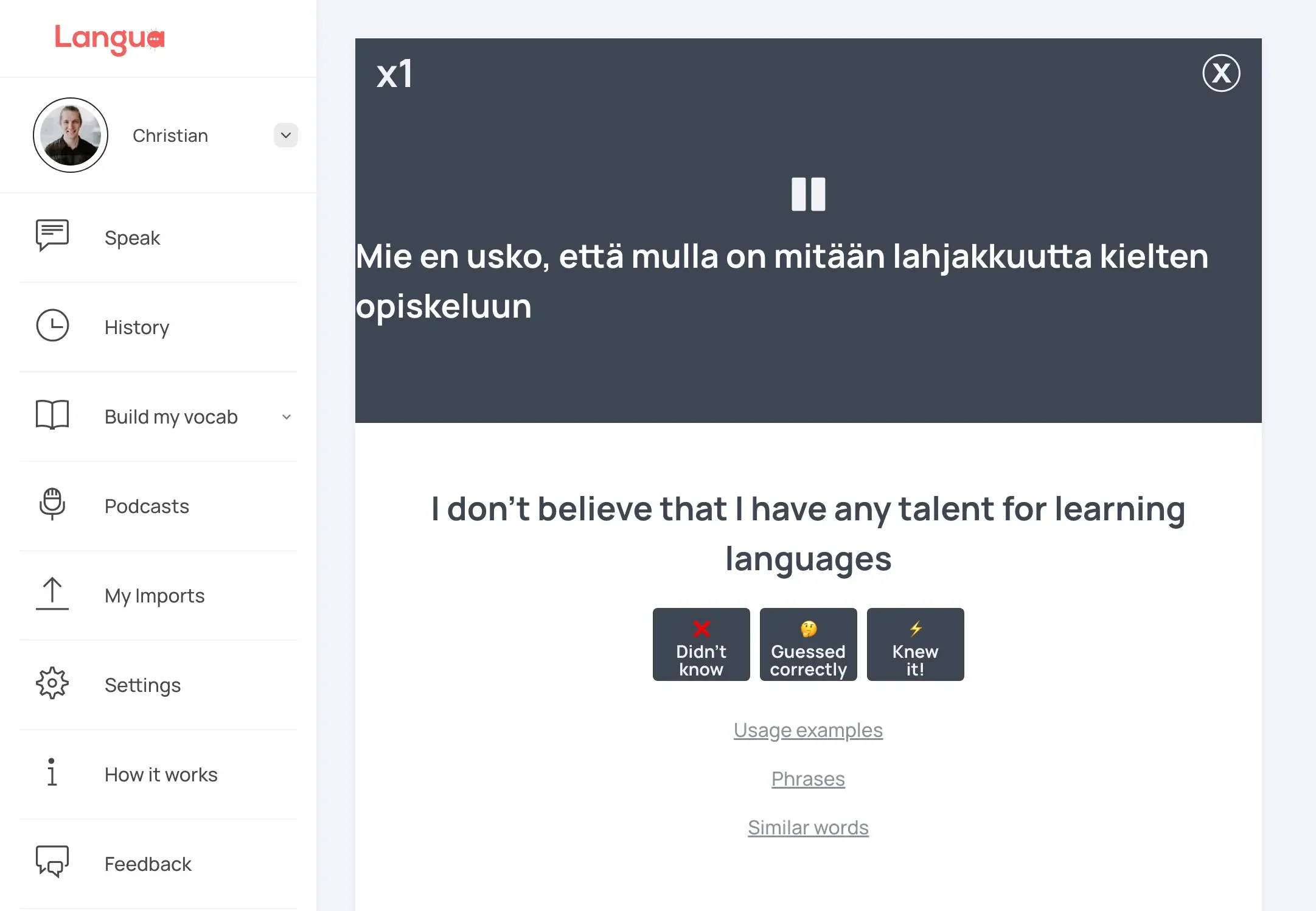 A Langua flashcard showing a Finnish sentence with its English translation underneath.