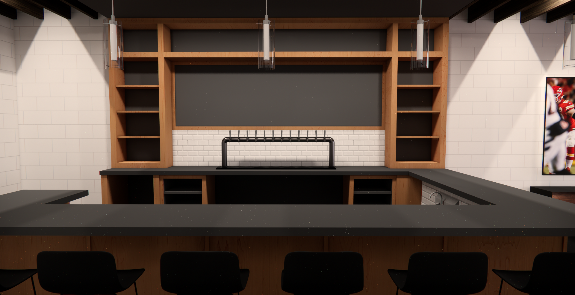 A modern kitchen with black countertops, white brick backsplash, and open wooden shelves above. There are black chairs in front, and a framed photo of football players partially visible on the right wall. Several pendant lights hang from the ceiling.