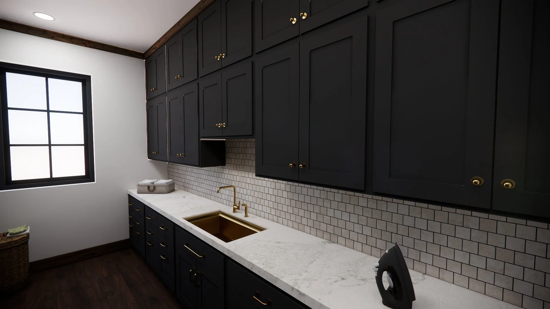 Modern kitchen with black cabinets, white marble countertop, and gold fixtures. Features a gold sink and faucet, small tiled backsplash, window, and a basket in the corner.