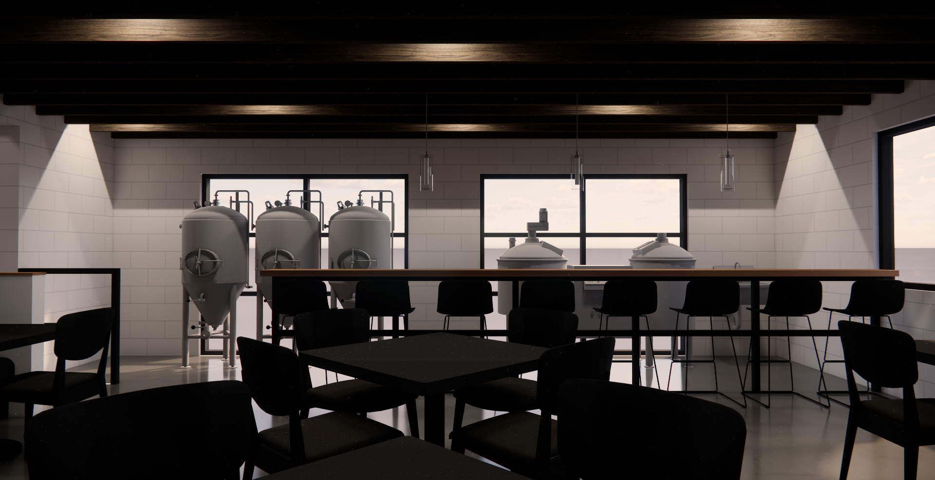 Interior of a brewery with large fermentation tanks, a long wooden bar with black chairs, and black tables with black chairs, illuminated by ceiling spotlights and natural light from large windows.