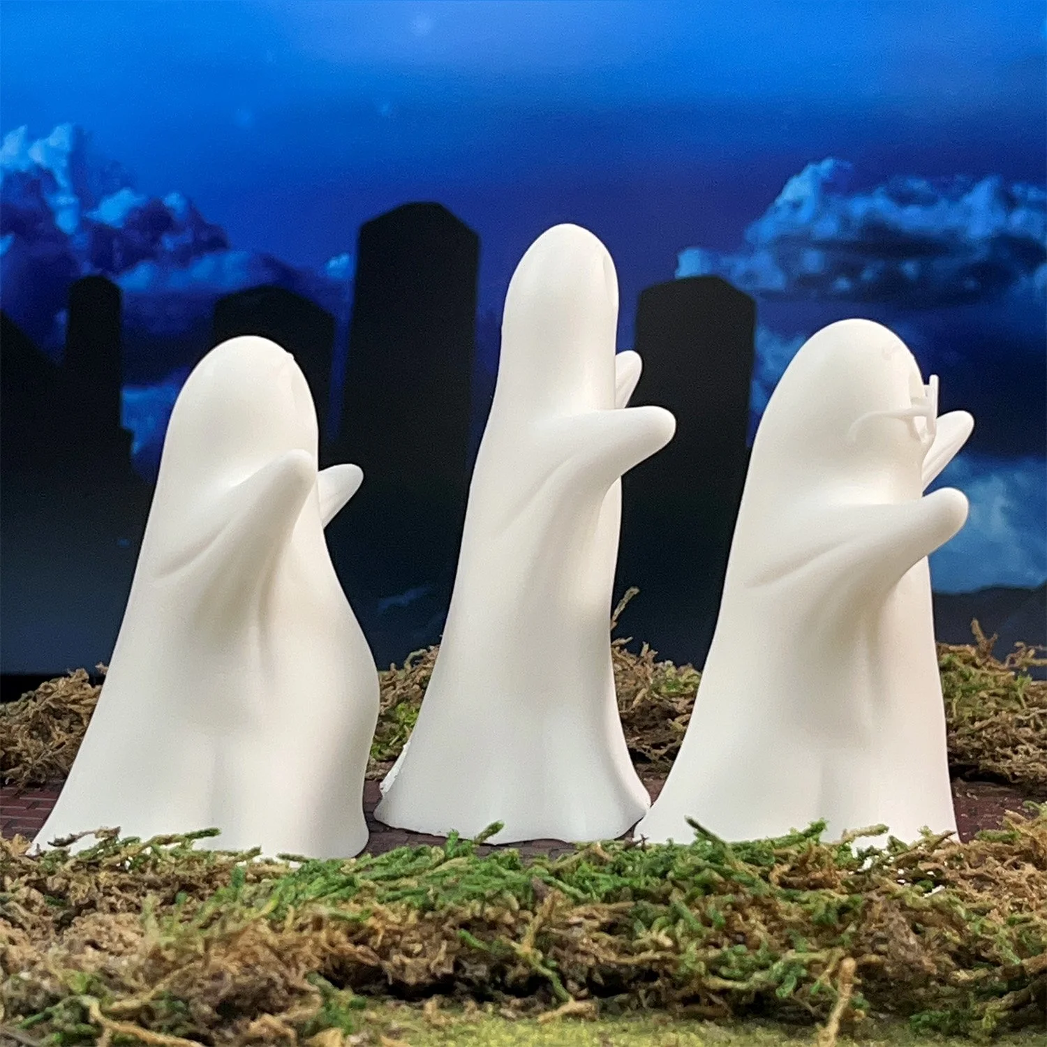 Small 3D printed ghost statues for modern Halloween style