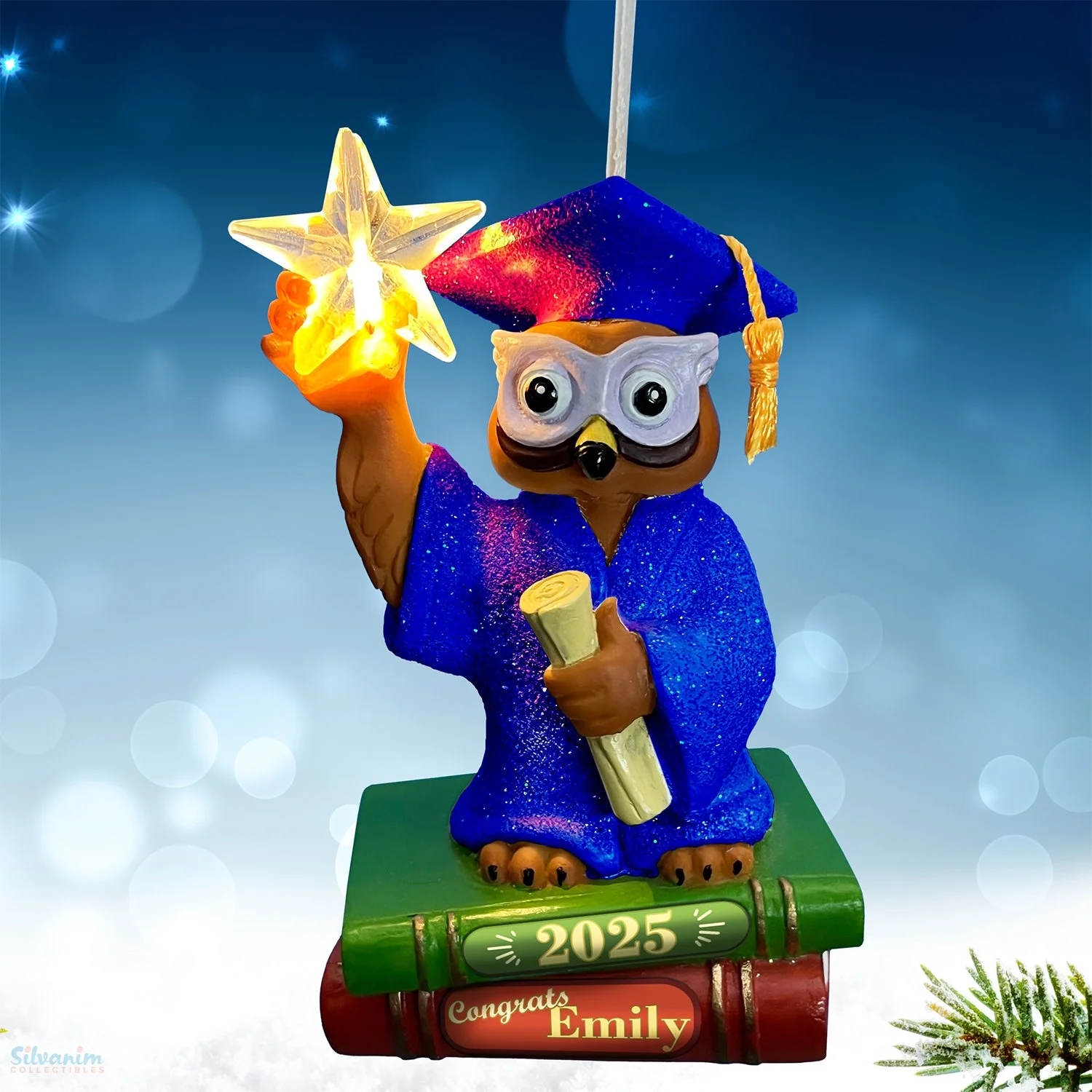 Personalized Graduation Owl Ornament with blue cap, blue gown, and diploma on Christmas tree