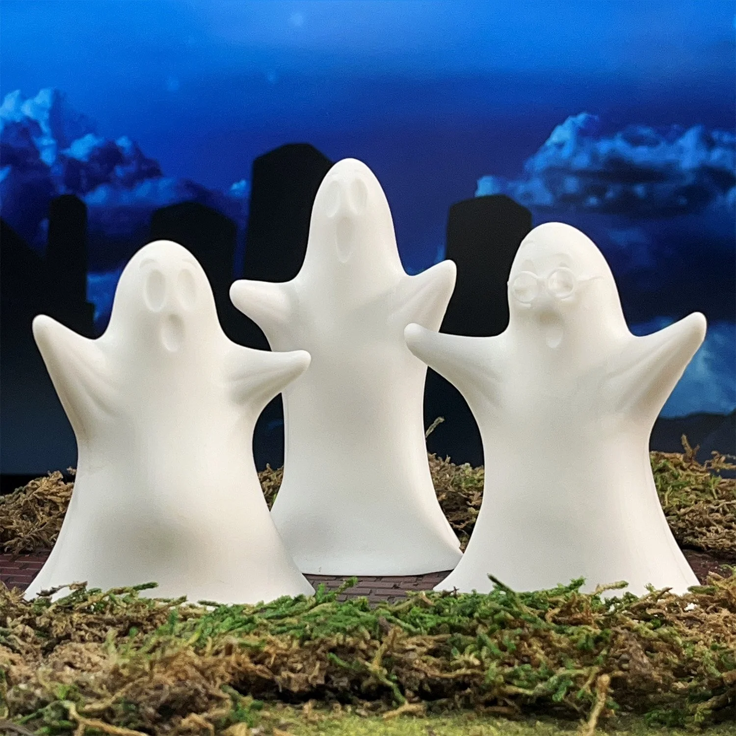 Minimalist 3D printed Halloween ghosts in white plastic