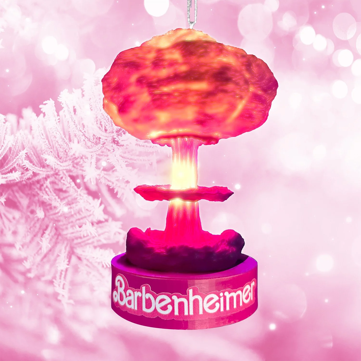 3D-printed Barbenheimer nuclear explosion Christmas ornament with pink hand-painted design