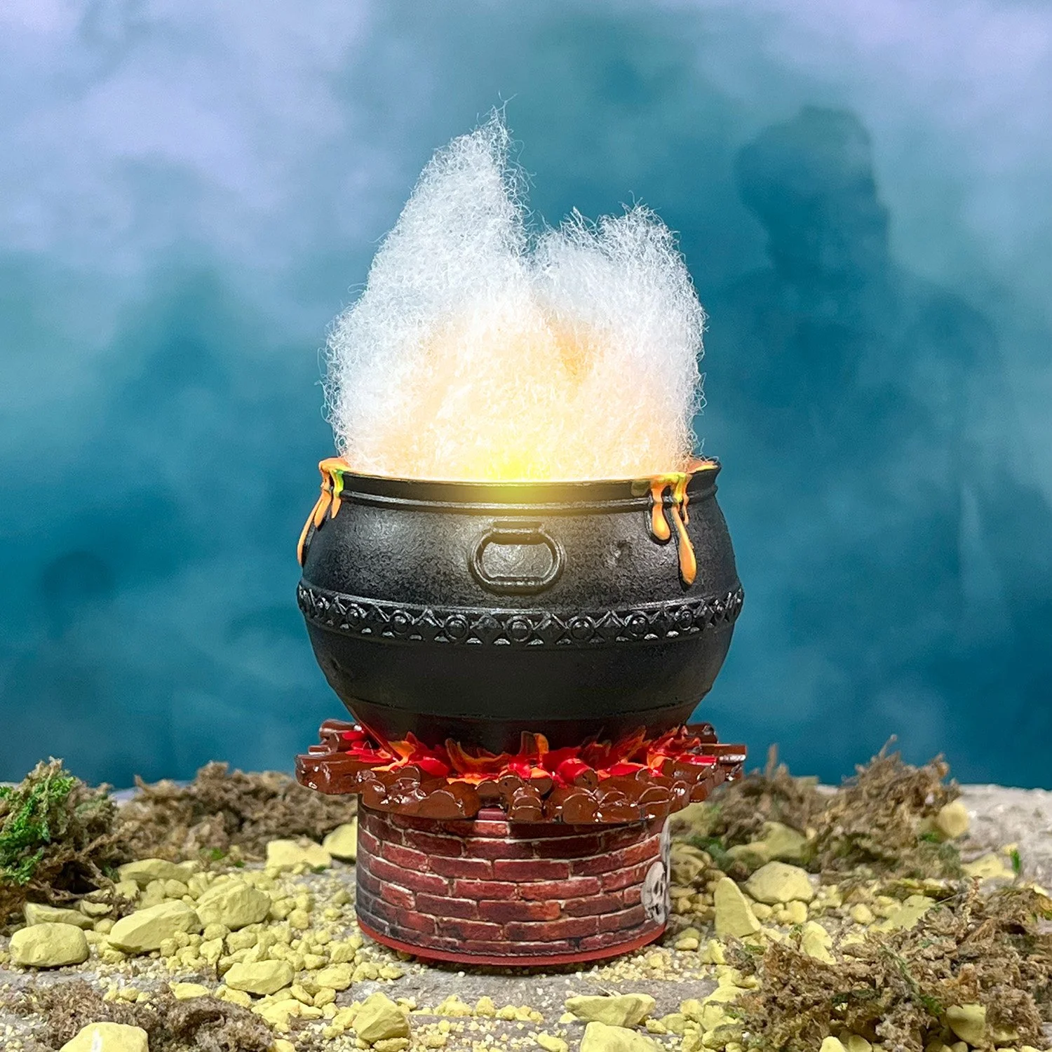 Close-up of detailed hand-painted Halloween witch potion cauldron