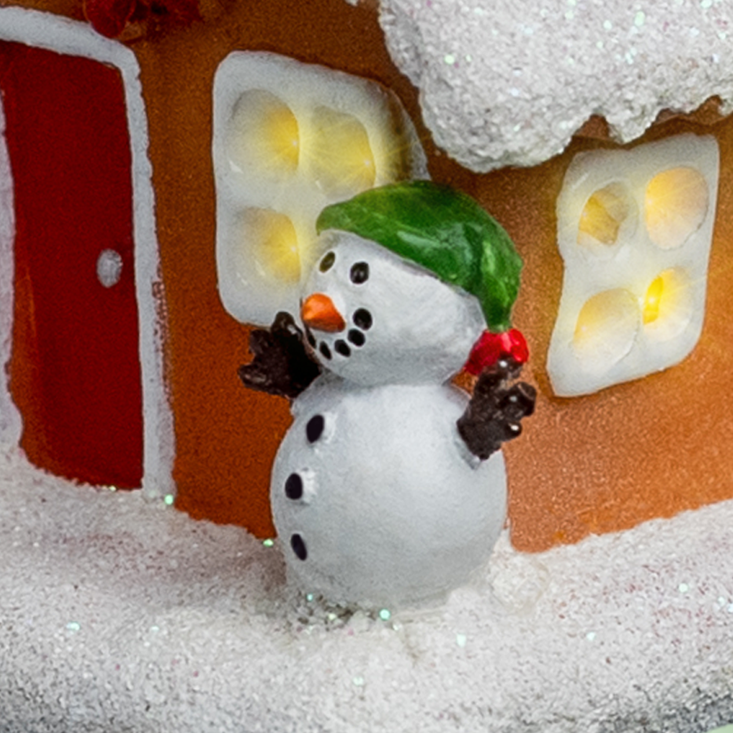 Gingerbread House-2026-Closeup-Snowman.png