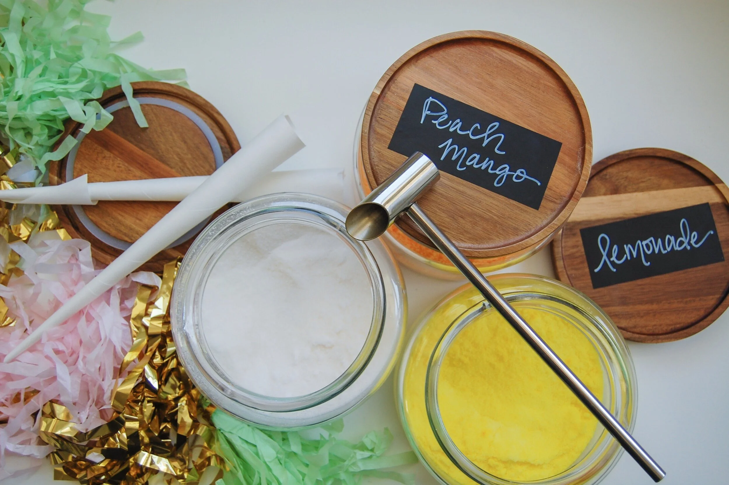 Containers of flavored sugars