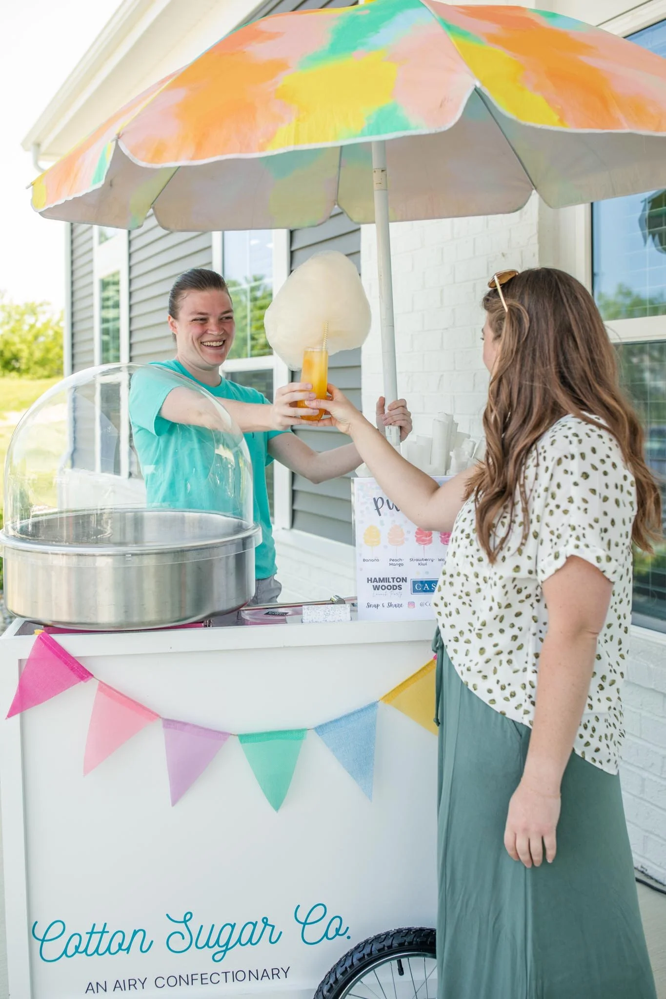 Cotton candy cart with drink topping