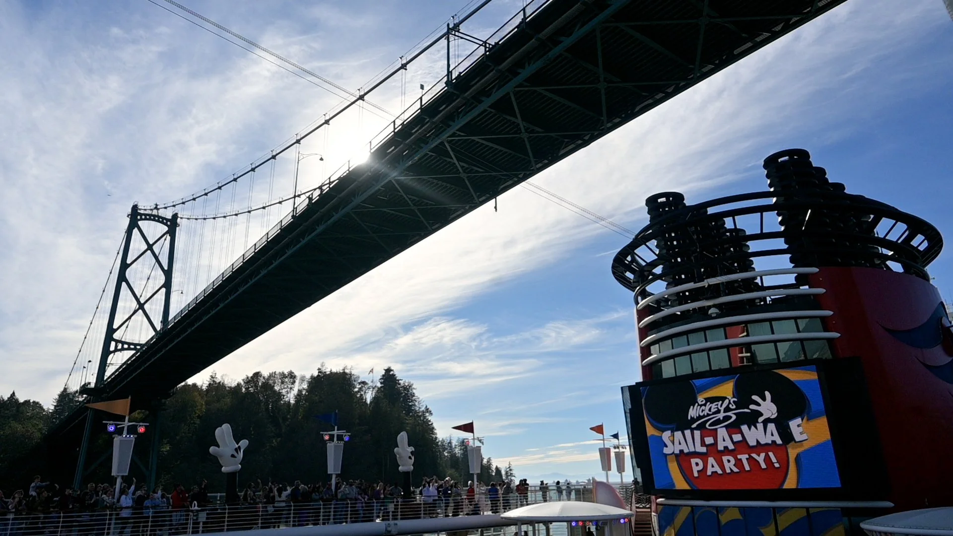 Sailing under the Lions Gate Bridge in Vancouver, BC, Canada on board the Disney Wonder during the Mickey's "Sail-a-Wave" Party