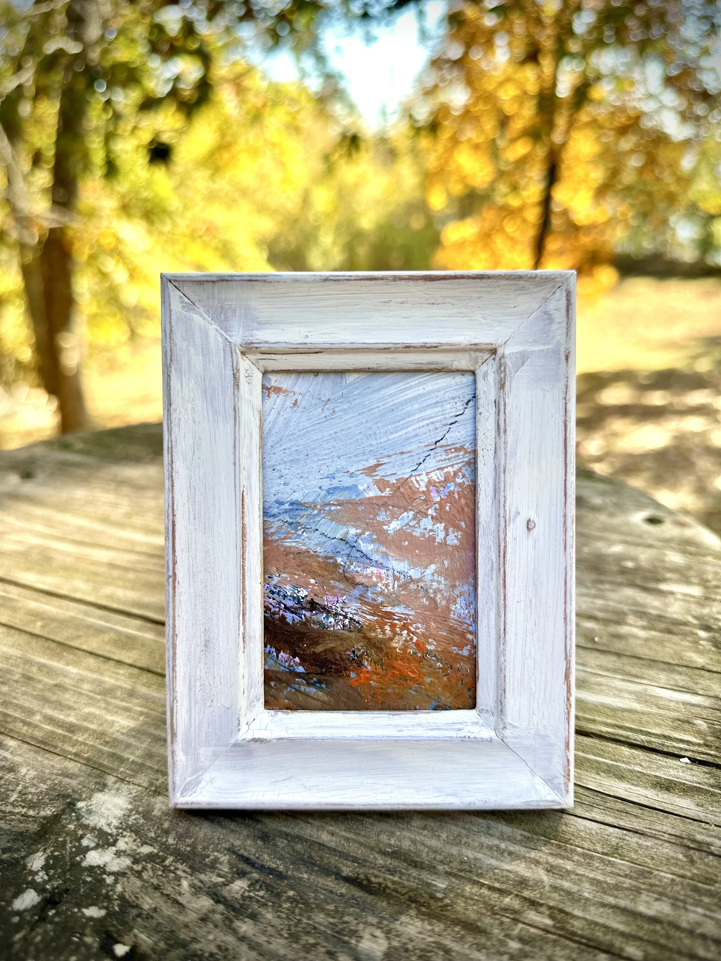 mini abstract landscape painting in white frame.jpeg
