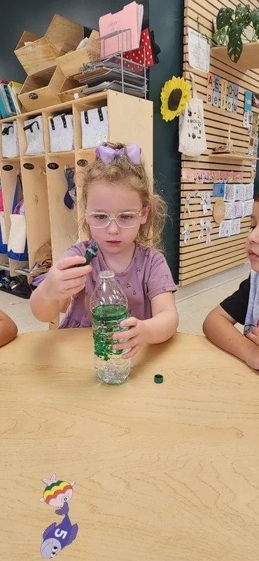 Ocean In A Bottle experiment during our water themed month.