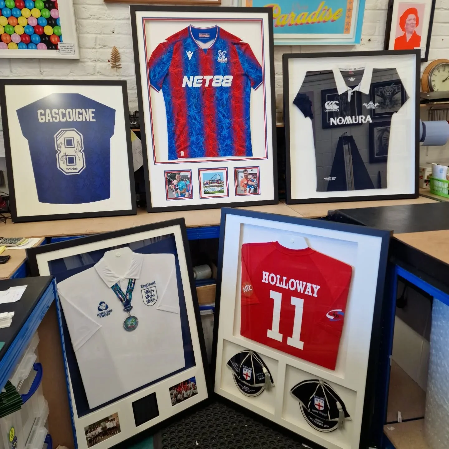 Sport shirt run at The Bespoke Framer, today. World cup of fishing with medal, Walking football international shirt with caps, Canterbury Rugby club, Crystal Palaces, a famous 2024/25 FA cup winning shirt and Gazza's game worn Rangers F.C. shirt.

Al