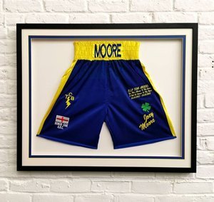 Joey Moore boxing shorts in a deep frame