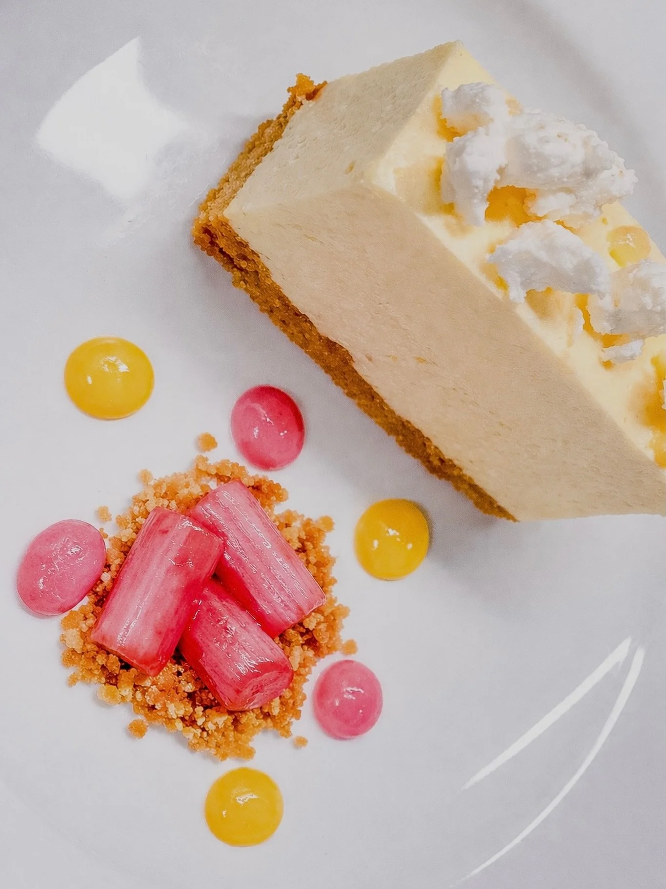 Lemon Curd Cheesecake 
Rhubarb, Meringue Pieces, Candied Ginger Crumble 

#crafteventco #fooddrinkhandcrafted #dessert #lemoncurdcheesecake #corporate
