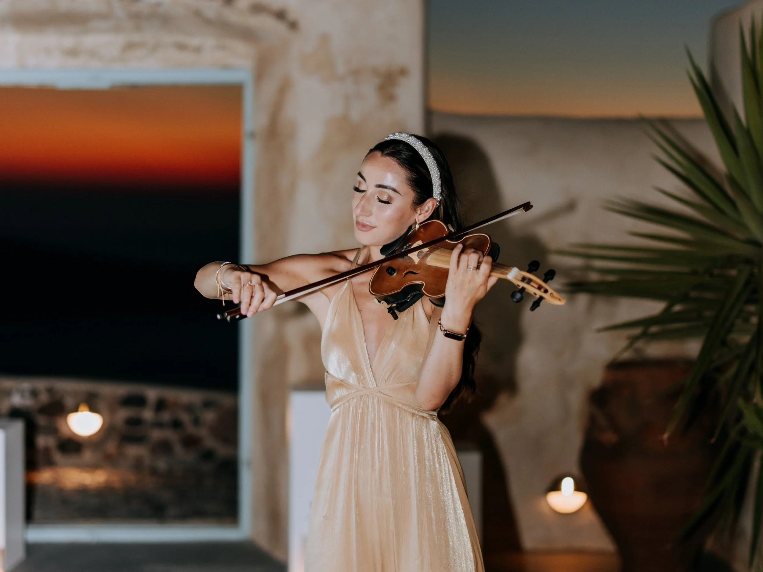 Santorini wedding violinist, luxury music in Athens, destination wedding violinist, Mykonos wedding violinist in Greece, ceremony music, Santorini wedding reception music, romantic violinist for weddings in Greece, Evangeline Victoria.